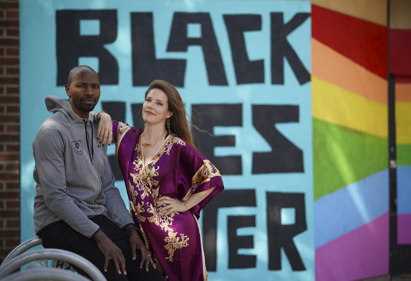 Jamil and Sara Stamschror-Lott outside All Square on Minnehaha Avenue S.