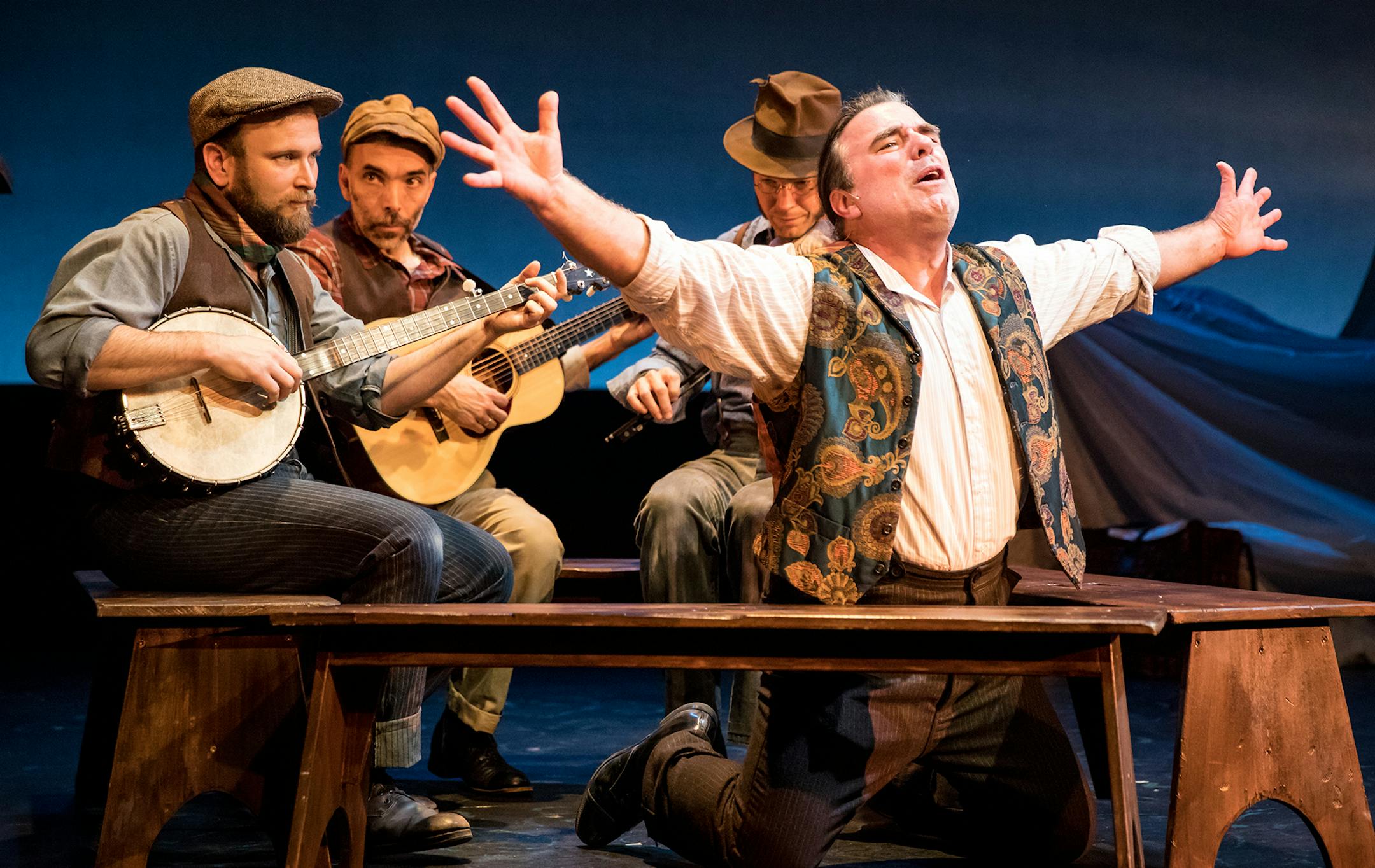 Jack Weston (with musicians Kevin Kniebel, Jim Parker and Nate Sipe) plays Ishmael and other characters in "Ishmael" at the Jungle Theater.