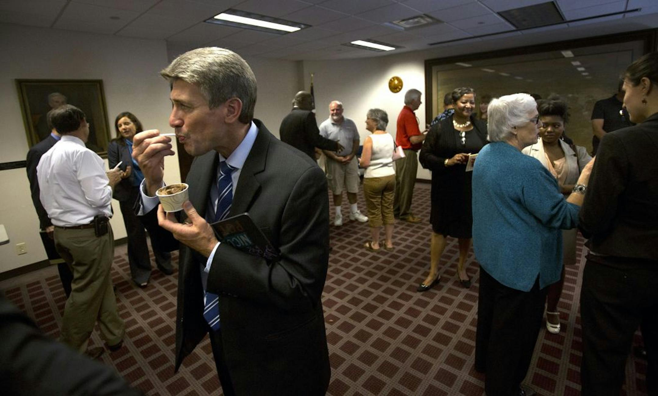 Minneapolis Mayor R.T. Rybak enjoyed some Sebastian Joe's ice cream — chocolate with sea salt, fudge, Heath bar and fudge cups, a flavor known as Nicollet Avenue Pot Hole — after his 2013 budget adddress on Wednesday.