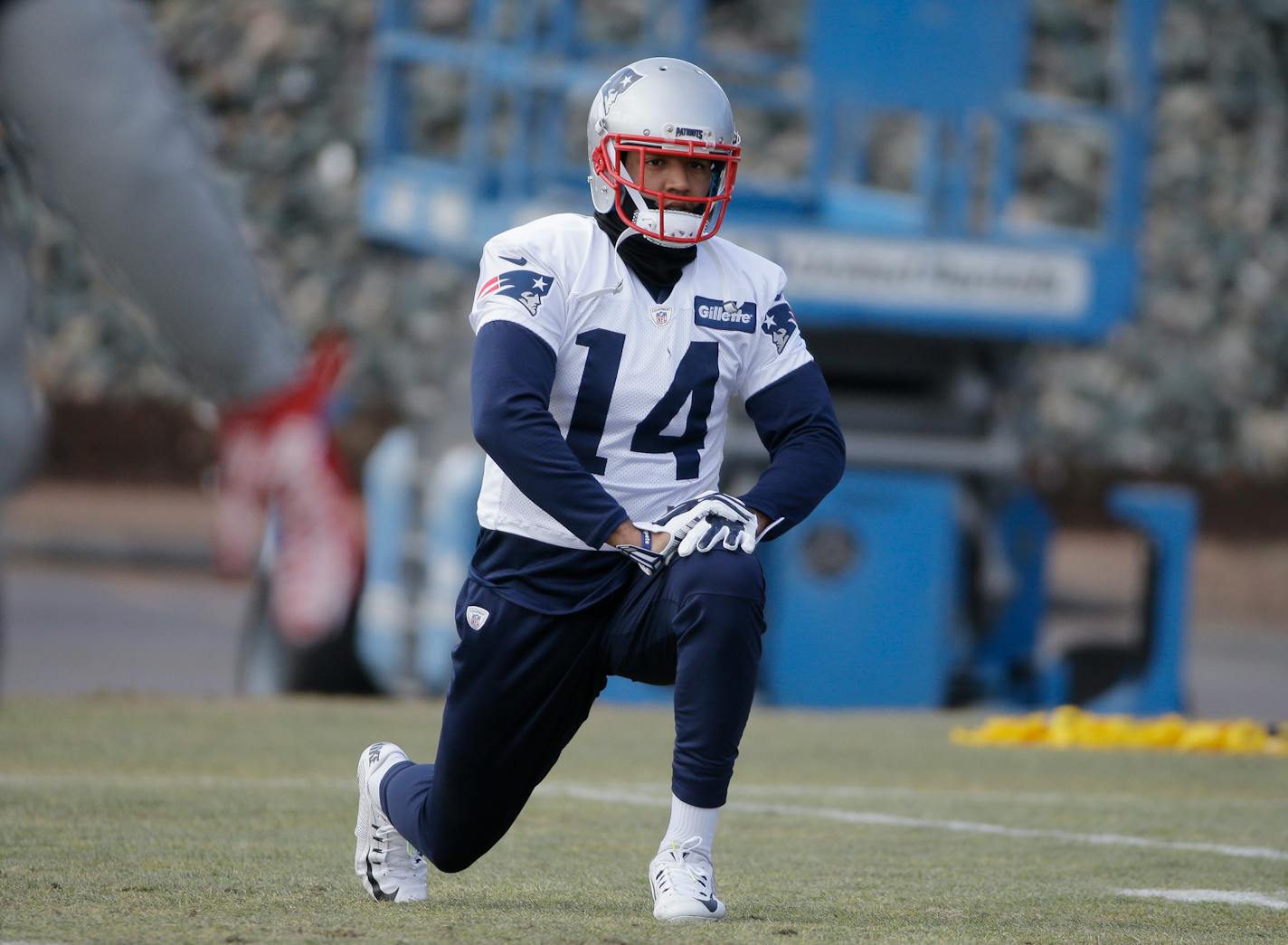 New England Patriots wide receiver Michael Floyd stretches while warming up during practice, Thursday, Jan. 12, 2017, in Foxborough, Mass.