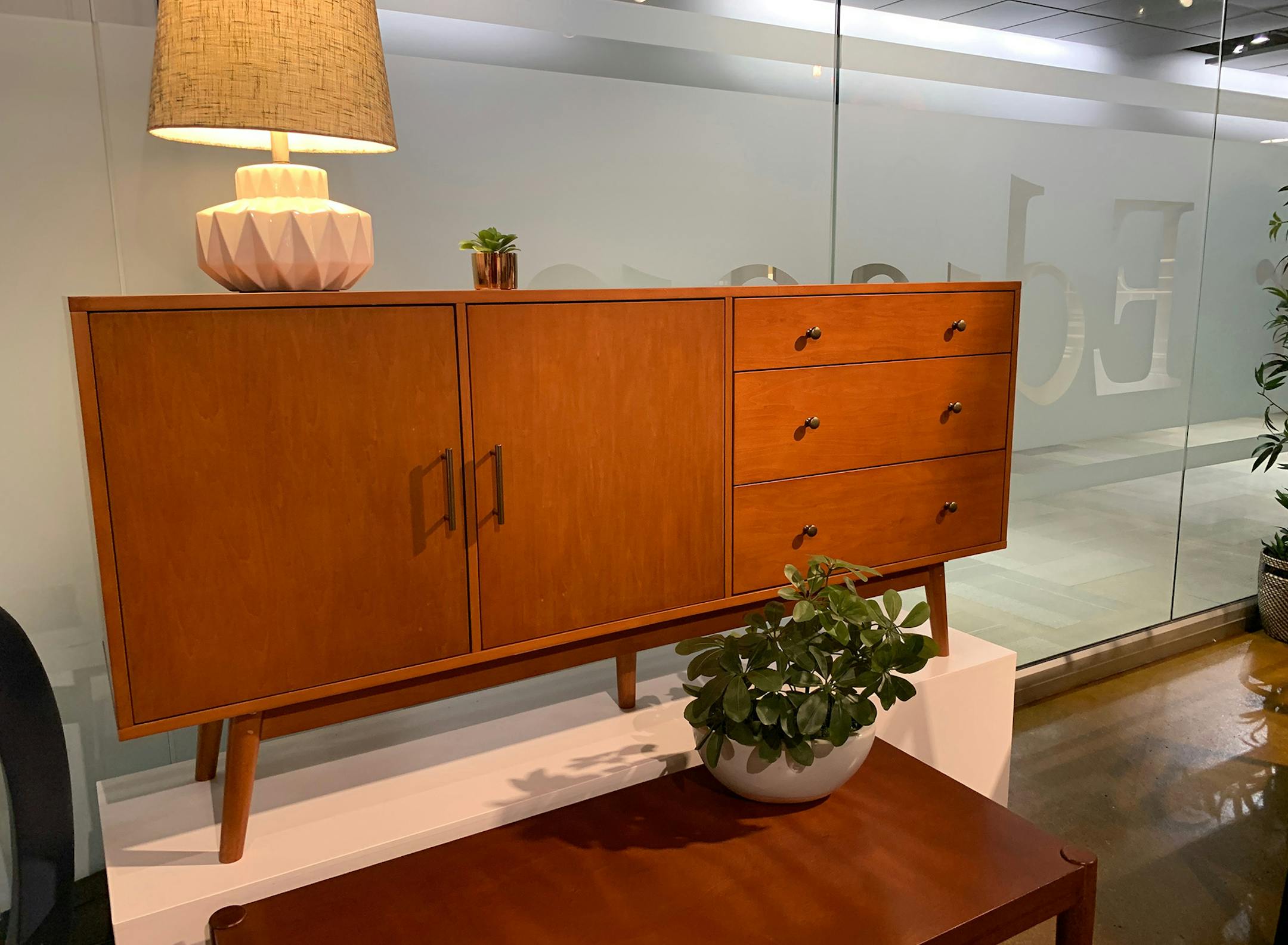 Midcentury-modern-inspired pieces like this sideboard continue to grace new home furnishing collections.