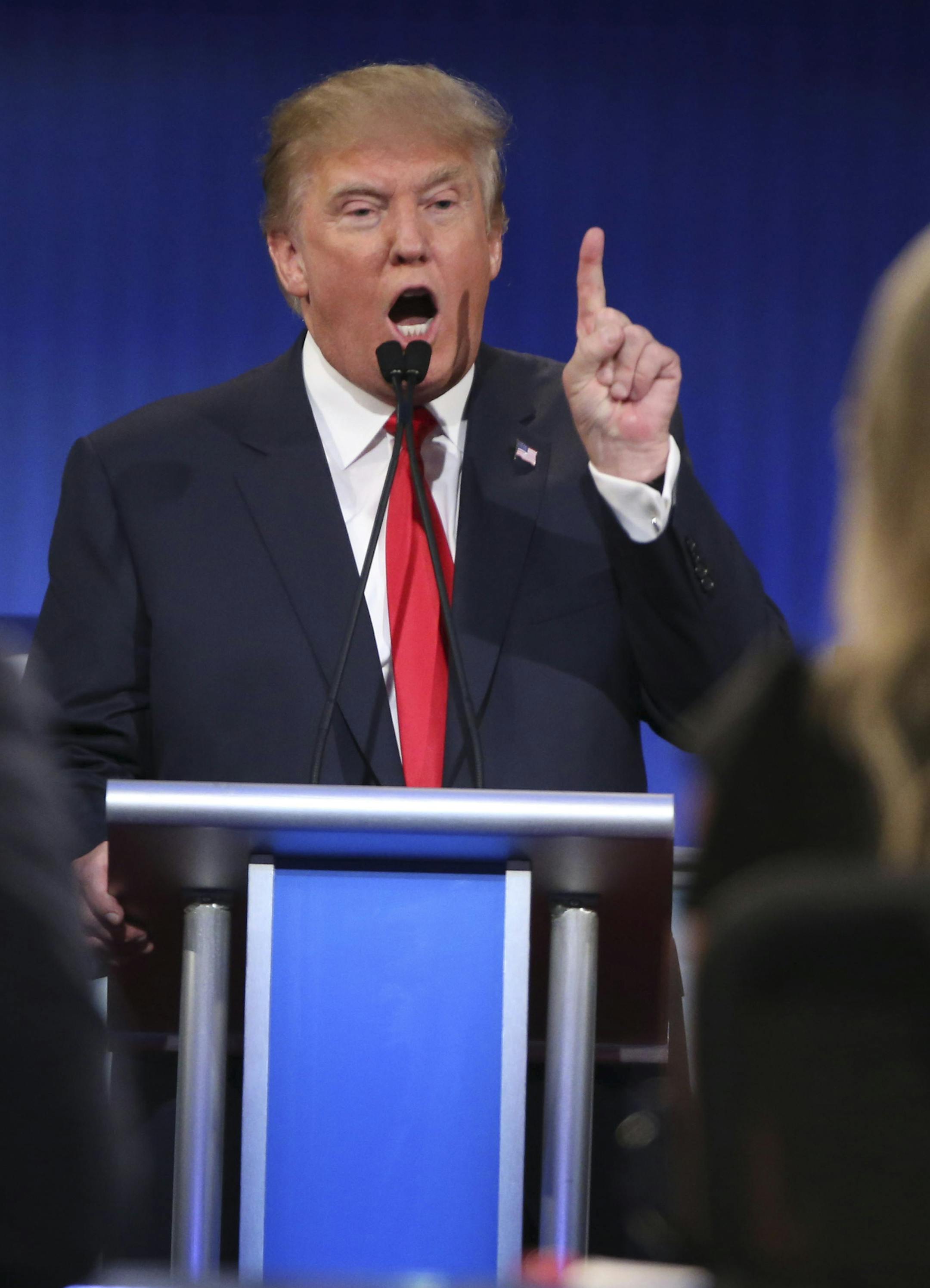 FILE &#xf3; Donald Trump speaks during a presidential debate hosted by Fox News at the Quicken Loans Arena in Cleveland, Aug. 6, 2015. Voters are legitimately cross-pressured between their traditional party and their issues with the current set of nominees for president. (Doug Mills/The New York Times)