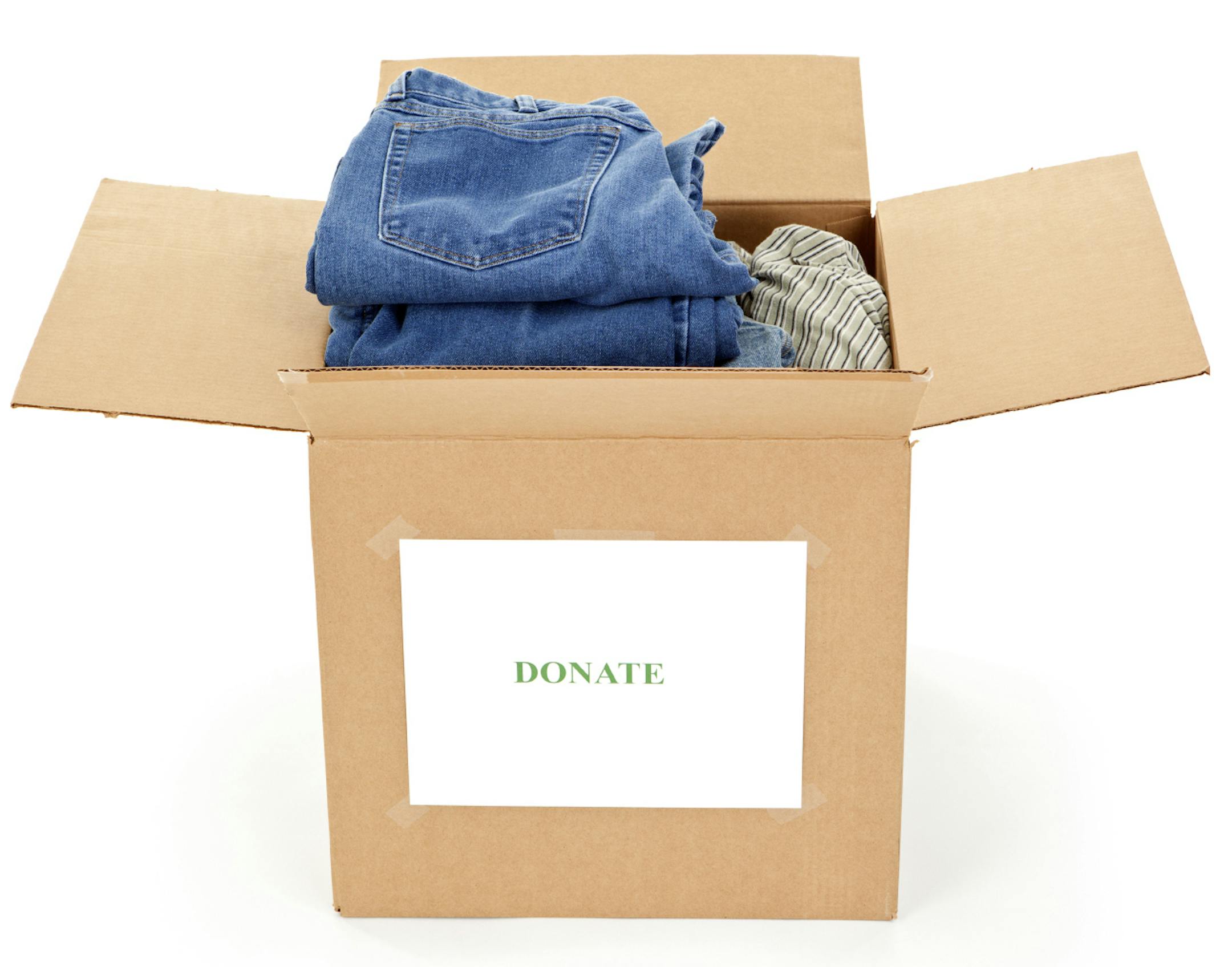 credit: Don Nichols, iStock Box of clothing to donate, isolated on white. Charity donation.