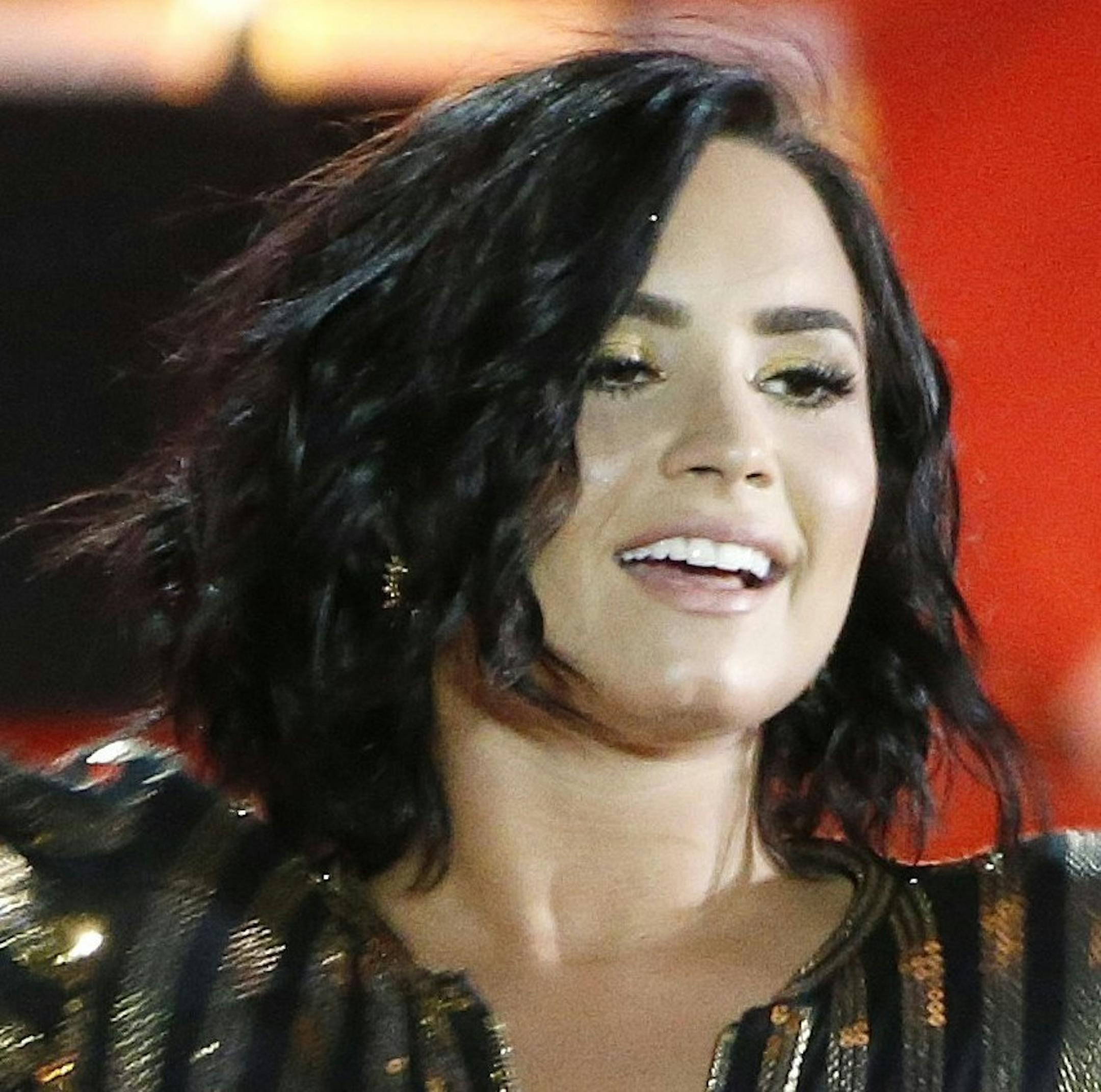 Demi Lovato performs during rehearsal for the annual Boston Pops Fireworks Spectacular on the Esplanade in Boston, Sunday, July 3, 2016. Hundreds of thousands of people are expected to line the banks of Bostonís Charles River to watch the fireworks there on Independence Day, with millions more across the country watching live on CBS. (AP Photo/Michael Dwyer)