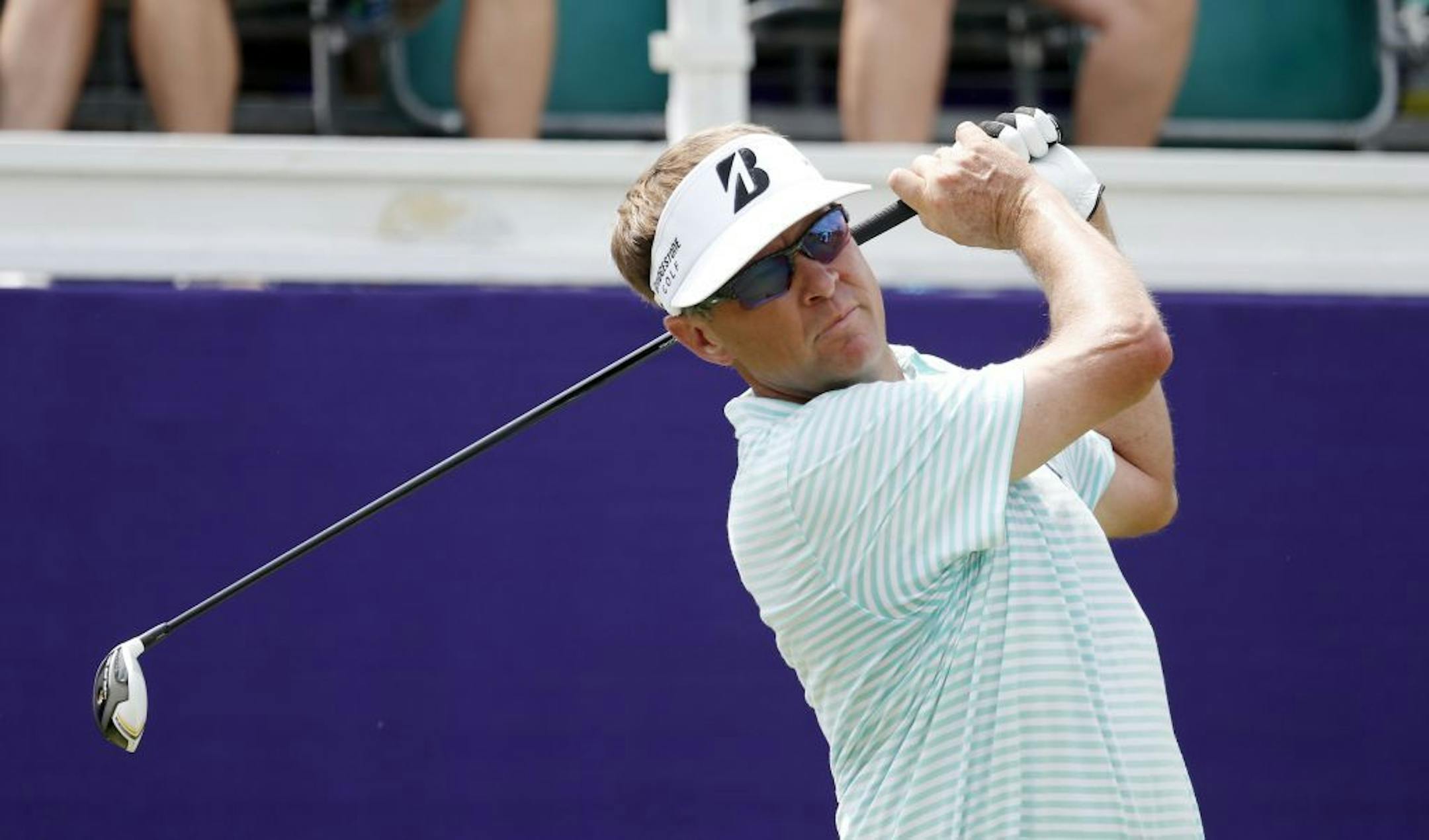 Davis Love III watches his drive on the 10th hole during the first round of the St. Jude Classic