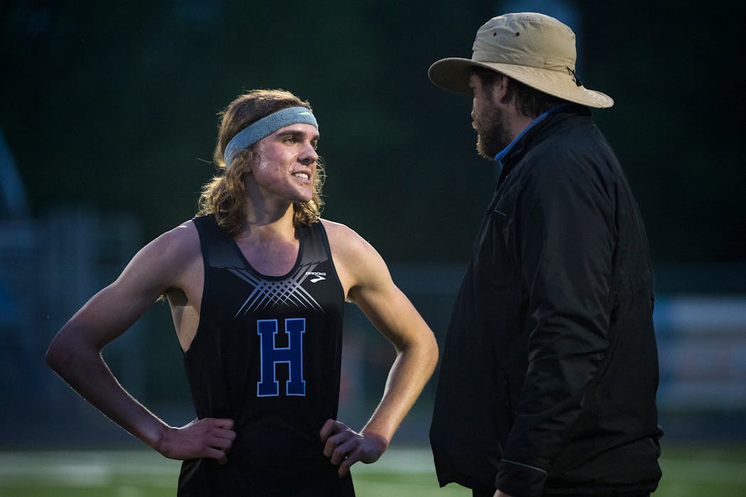 Joe Klecker talked with his Hopkins High School track coach, Nick Lovas, after running a 3,200-meter race in 2015. “In 15 years at Hopkins, I’ve never enjoyed watching anyone compete more than I did watching Joe Klecker,” Lovas said.