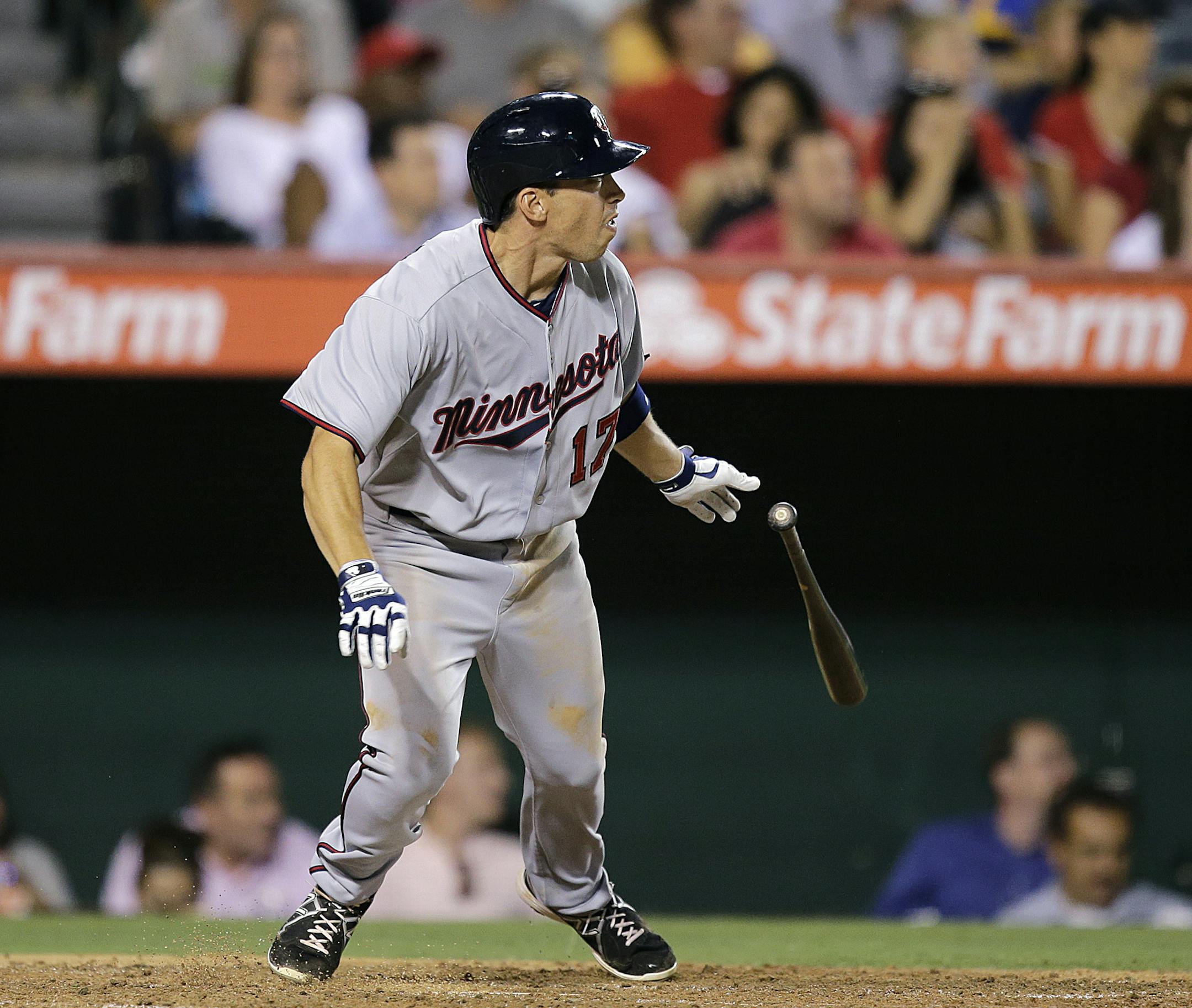 Minnesota Twins' Doug Bernier hits a double during the fourth inning of a baseball game against the Los Angeles Angels on Monday, July 22, 2013, in Anaheim, Calif. (AP Photo/Jae C. Hong)