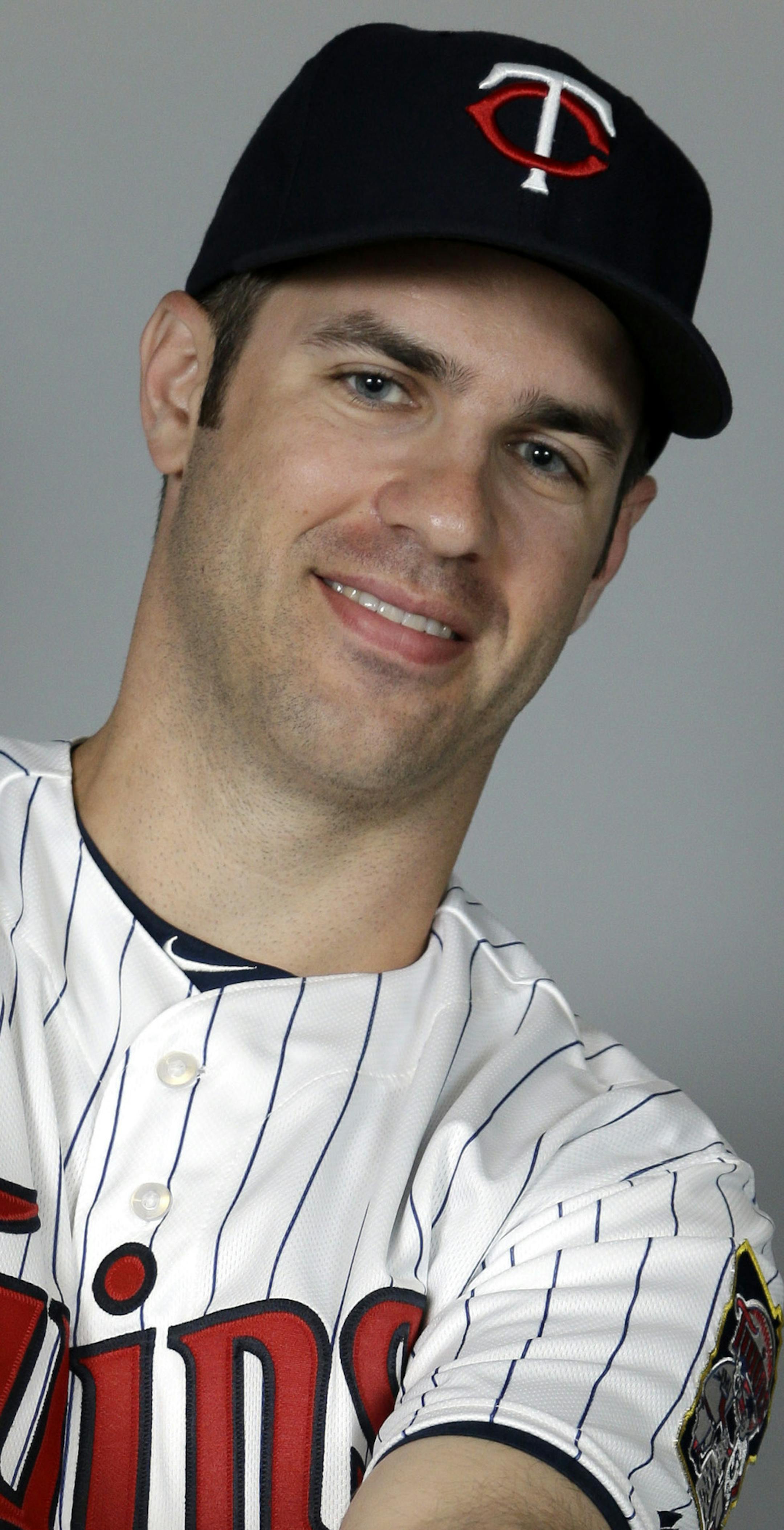 This is a 2014 photo of first baseman Joe Mauer of the Minnesota Twins baseball team. This image reflects the Twins active roster as of Tuesday, Feb. 25, 2014 when this image was taken. (AP Photo/Steven Senne)