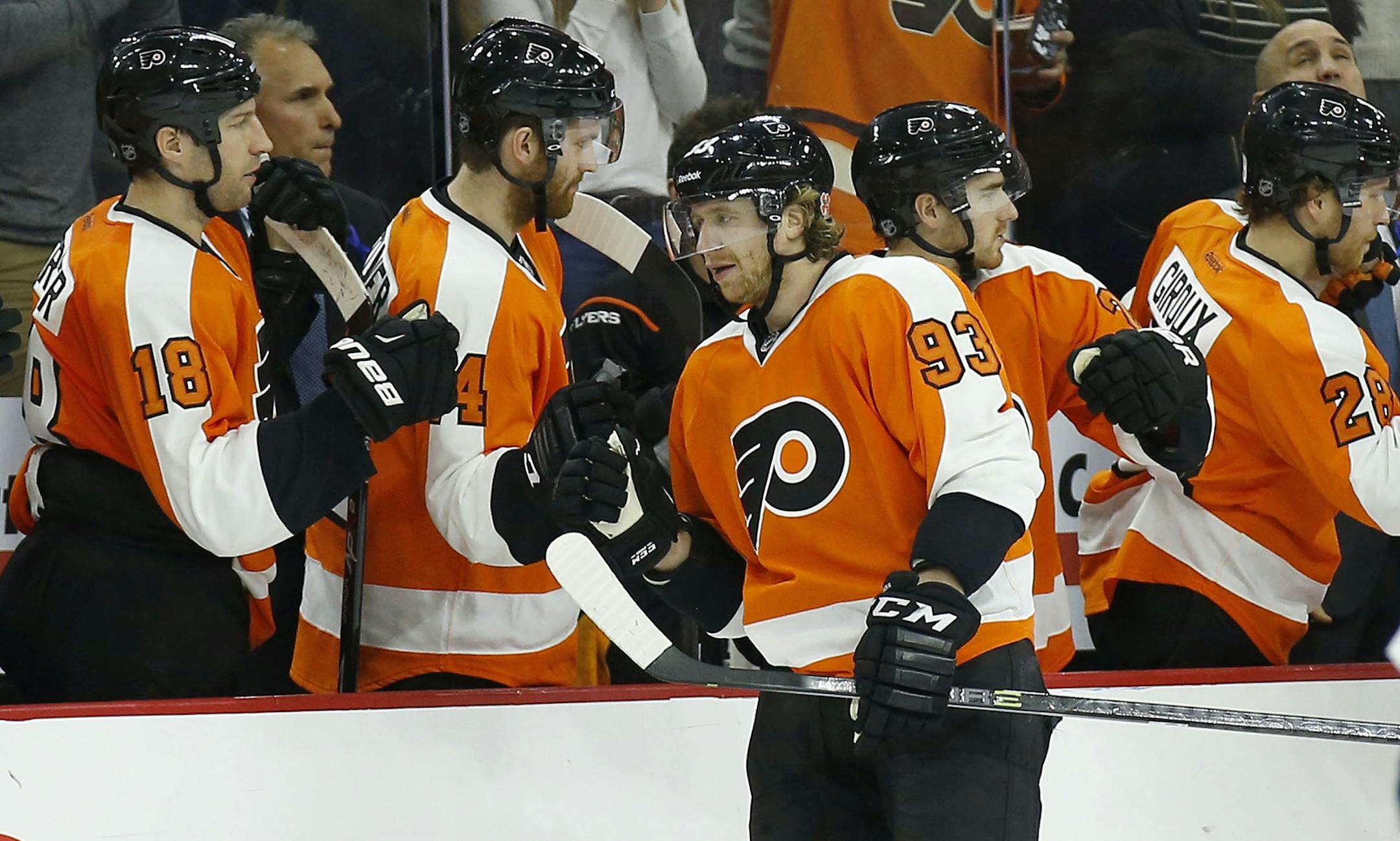 The Philadelphia Flyers' Jakub Voracek celebrates his second-period goal with his teammates on the bench against the Florida Panthers at the Wells Fargo Center in Philadelphia on Thursday, Dec. 18, 2014. The Panthers won, 2-1, in a shootout. (Yong Kim/Philadelphia Daily News/TNS) ORG XMIT: 1161616 ORG XMIT: MIN1412182325090373