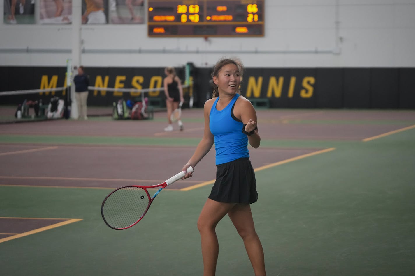 Minnetonka senior Sarah Shahbaz after winning the final point in her finals match against teammate Kelsey Phillips.