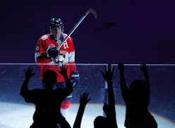 Florida Panthers center Aleksander Barkov gives a fan a hockey stick after being named one of the "Stars of the Game," after the Panthers defeated the
