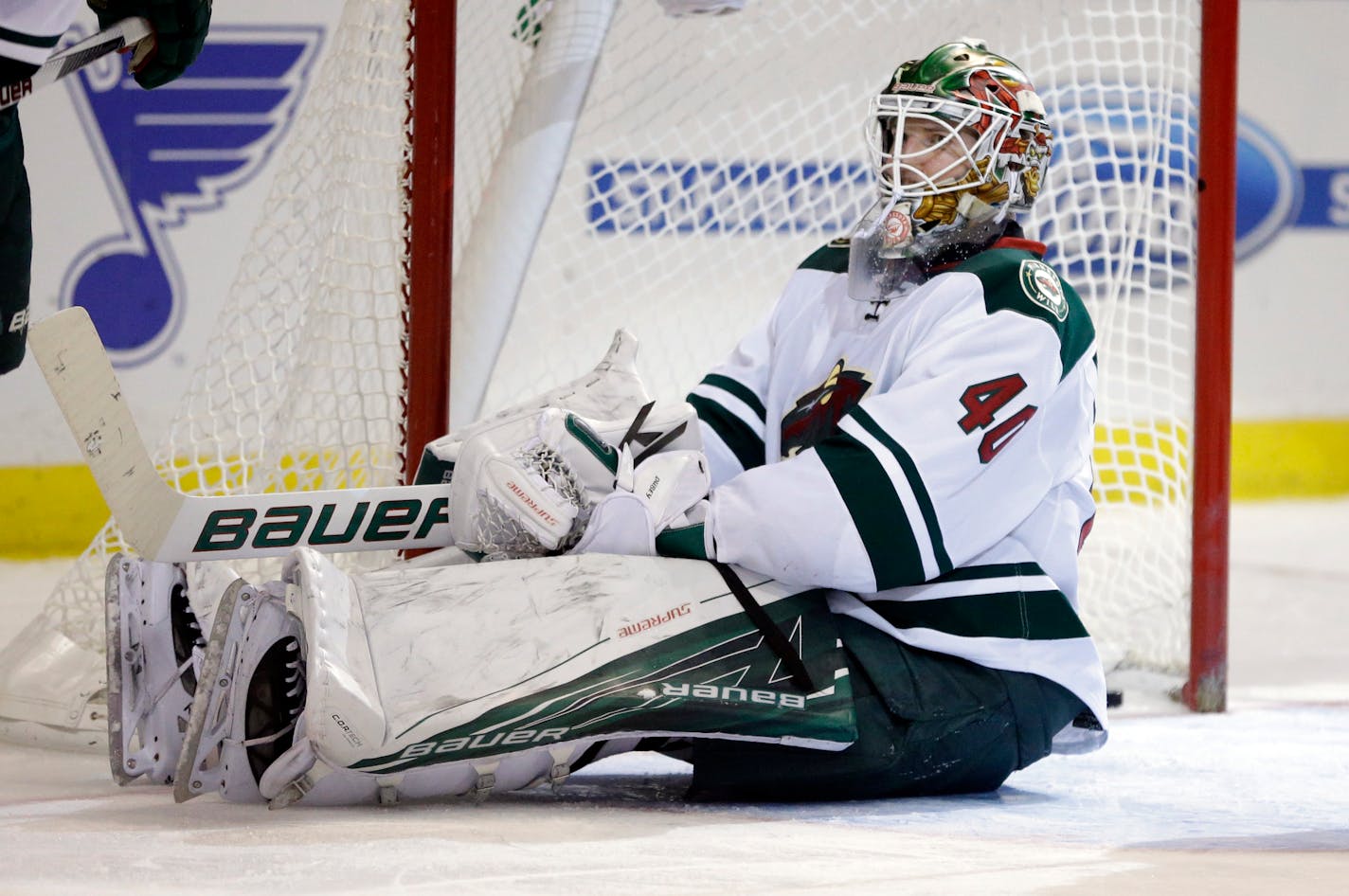 Minnesota Wild goalie Devan Dubnyk sits on the ice after giving up a goal to St. Louis Blues' Jori Lehtera, of Finland, during the second period of an NHL hockey game Saturday, Feb. 6, 2016, in St. Louis. (AP Photo/Jeff Roberson) ORG XMIT: MOJR108