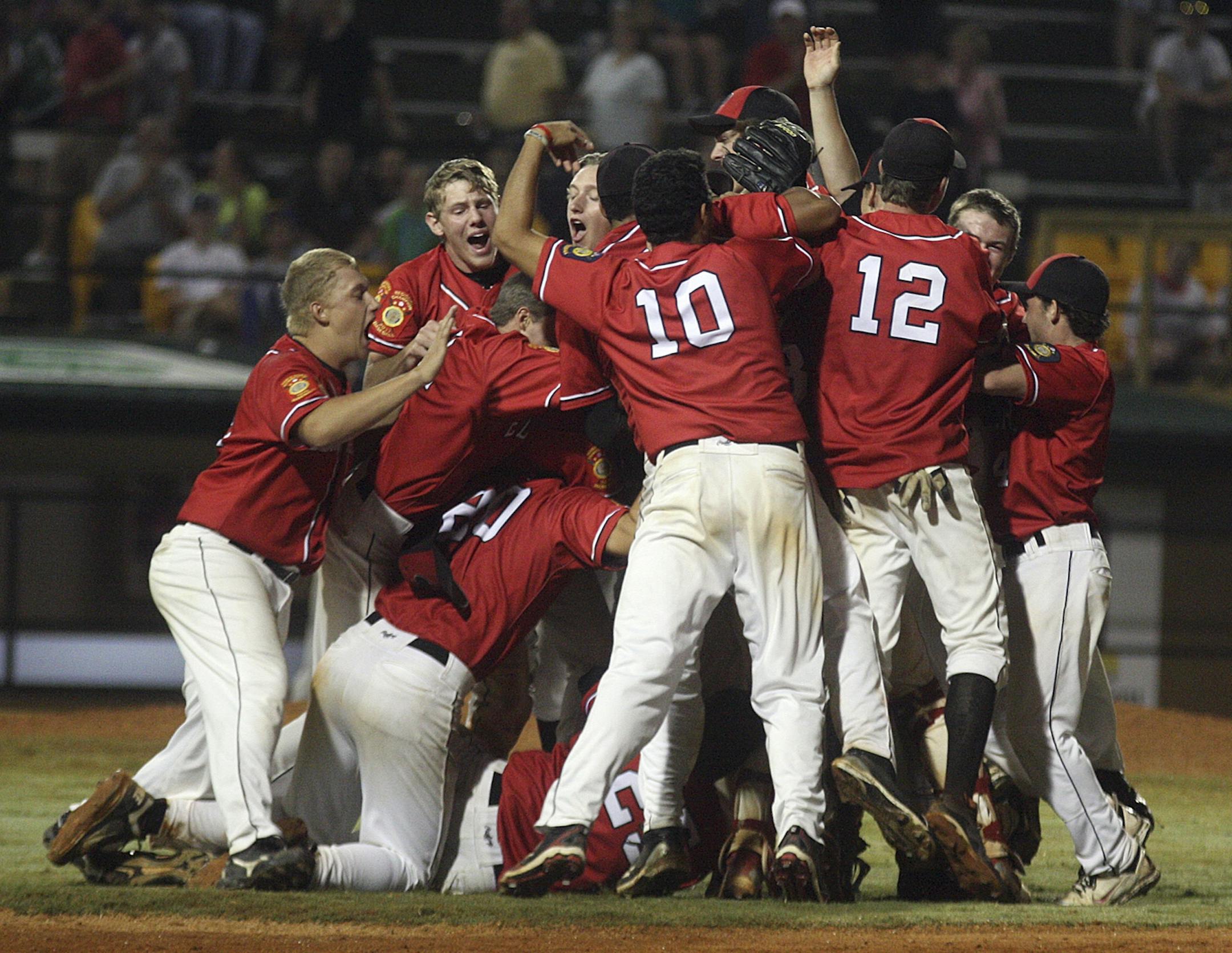 Eden Prairie players began the celebration Tuesday night in Shelby, N.C., after defeating Tupelo, Miss., 5-4 in 13 innings to win the American Legion World Series championship.