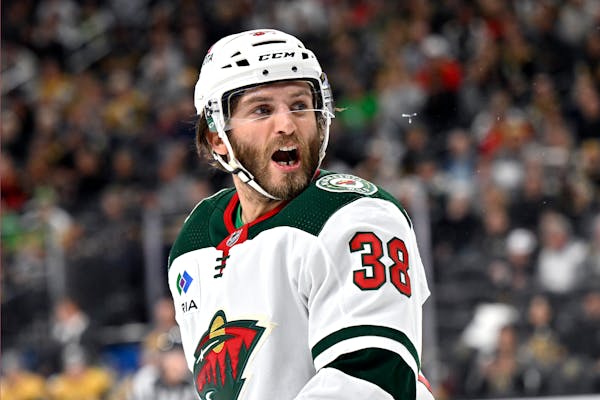 Minnesota Wild right wing Ryan Hartman (38) reacts after a penalty was assessed against him during the second period of an NHL hockey game against the