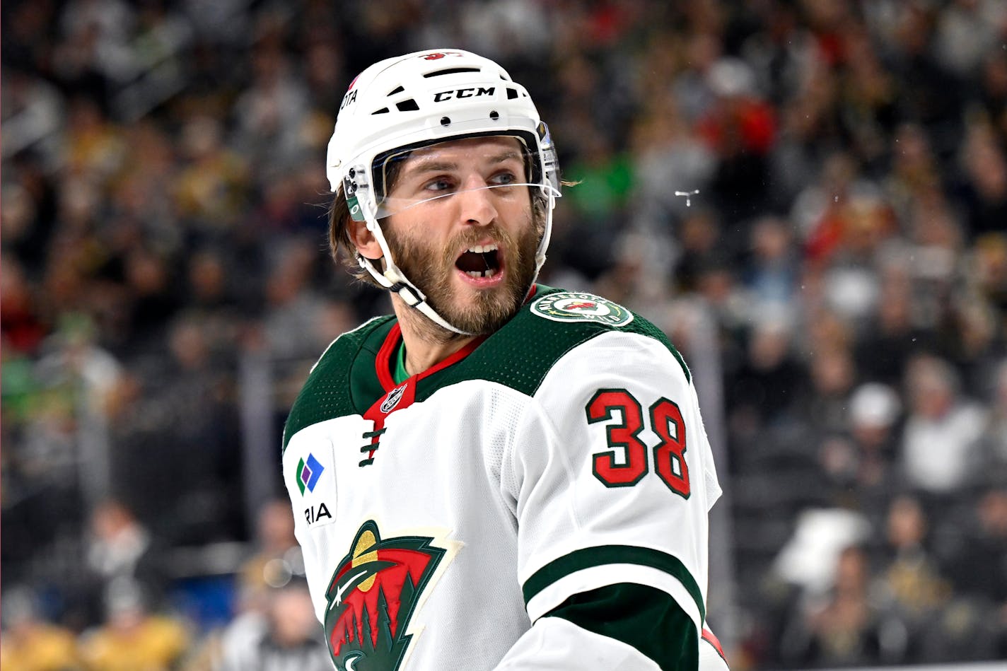 Minnesota Wild right wing Ryan Hartman (38) reacts after a penalty was assessed against him during the second period of an NHL hockey game against the Vegas Golden Knights, Saturday, April 1, 2023, in Las Vegas. (AP Photo/David Becker)