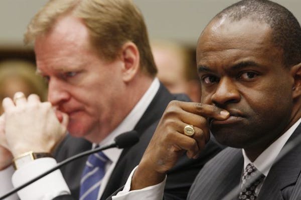 NFL Commissioner Roger Goodell (left), NFLPA Executive Director DeMaurice Smith