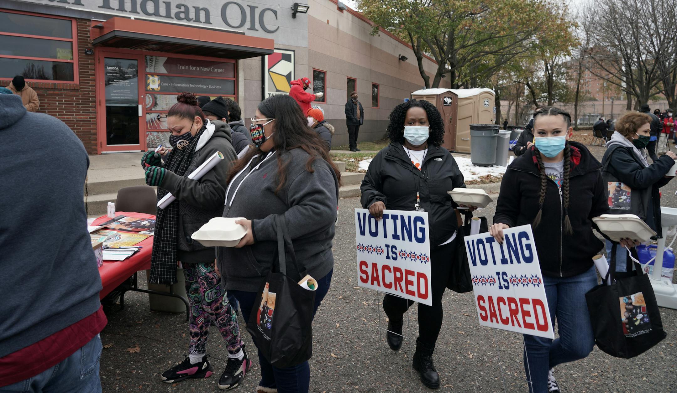 A steady stream of Native Indian voters attend an early voting celebration Thursday at the American Indian OIC. The ceremony included voter information, lawn signs, food and drumming before groups were guided to early polling places. Speakers included Minnesota Lt. Governor Peggy Flanagan. Justice Paul Thissen Minneapolis School Board Candidate Michael Due–es and American Indian OIC CEO Joe Hobot. brian.peterson@startribune.com Minneapolis, MN Thursday, October 29, 2020