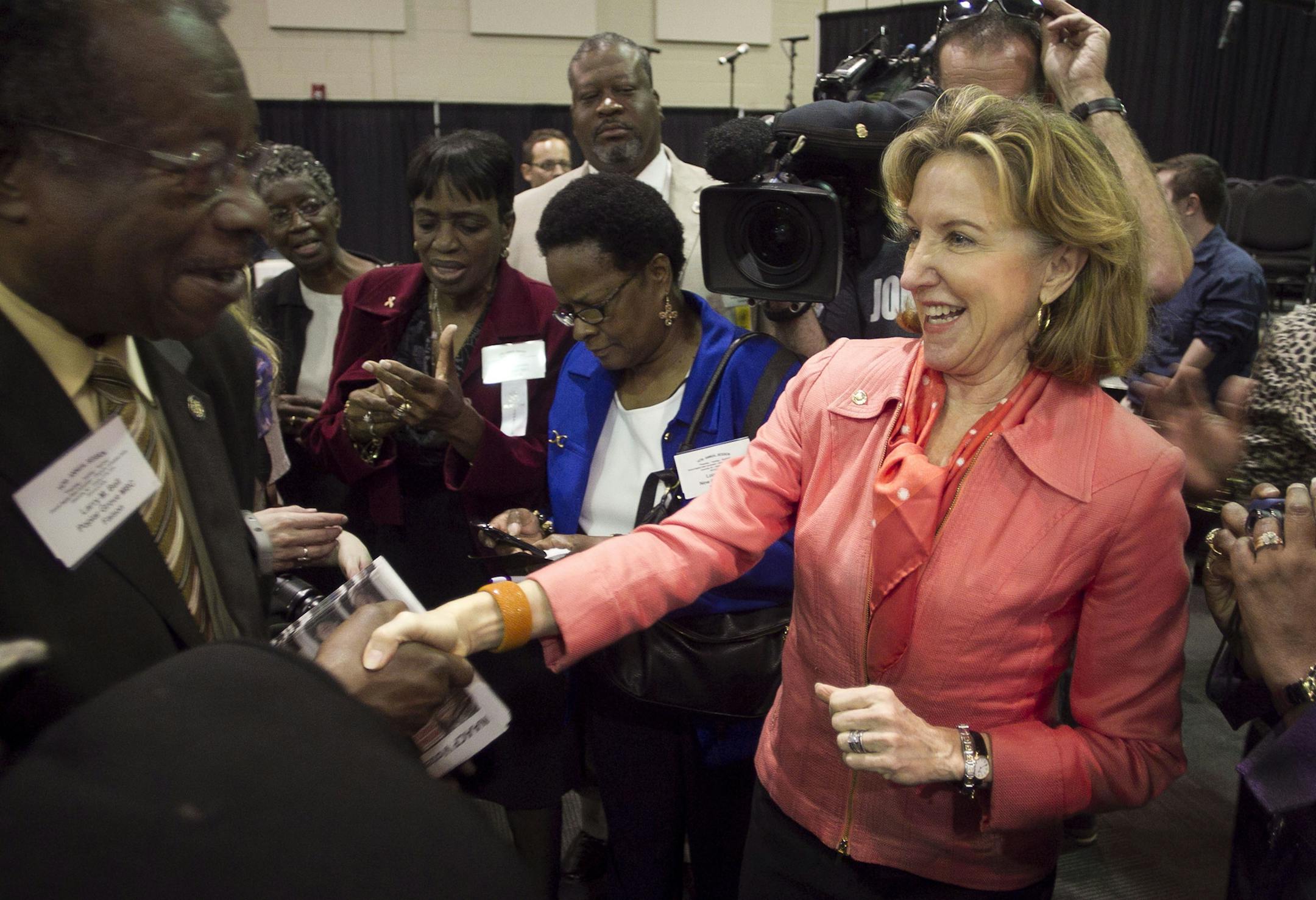 U.S. Sen. Kay Hagan greets Larry M. Bell of Faison, N.C. following her remarks at the 147th Annual Session of the General Baptist State Convention, Wednesday, Oct. 29, 2014, at the Greenville Convention Center in Greenville, N.C. (AP Photo/The News & Observer, Robert Willett)