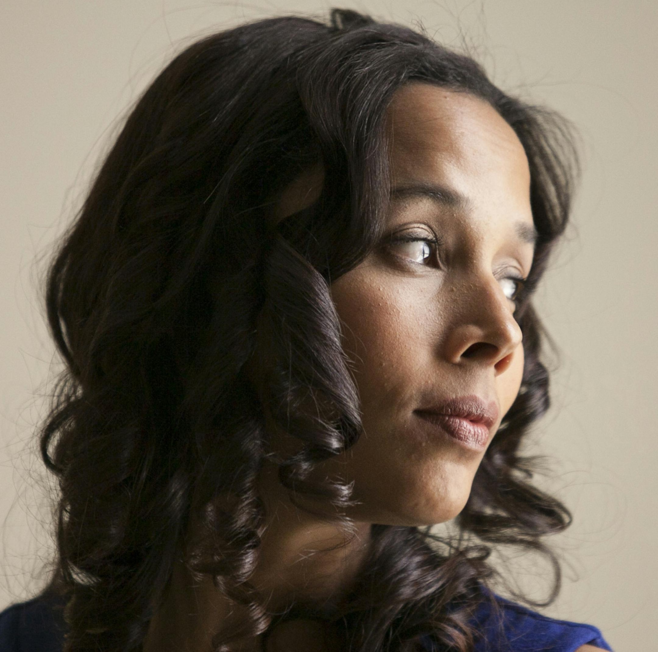 PHOTO MOVED IN ADVANCE AND NOT FOR USE - ONLINE OR IN PRINT - BEFORE JAN. 25, 2015. -- Musician Rhiannon Giddens in Washington, where she was to perform at the Lincoln Awards, Jan. 7, 2015. Giddens, celebrated on the folk circuit as the leader of the Carolina Chocolate Drops, is about to release a solo album, “Tomorrow Is My Turn," that steps beyond the tradition of African-American string bands. (Becky Harlan/The New York Times) ORG XMIT: XNYT32