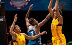 Sparks forward Nneka Ogwumike pulled down a rebound while being challenged under Minnesota's basket by Lynx forward Natasha Howard (3) in a June meeti