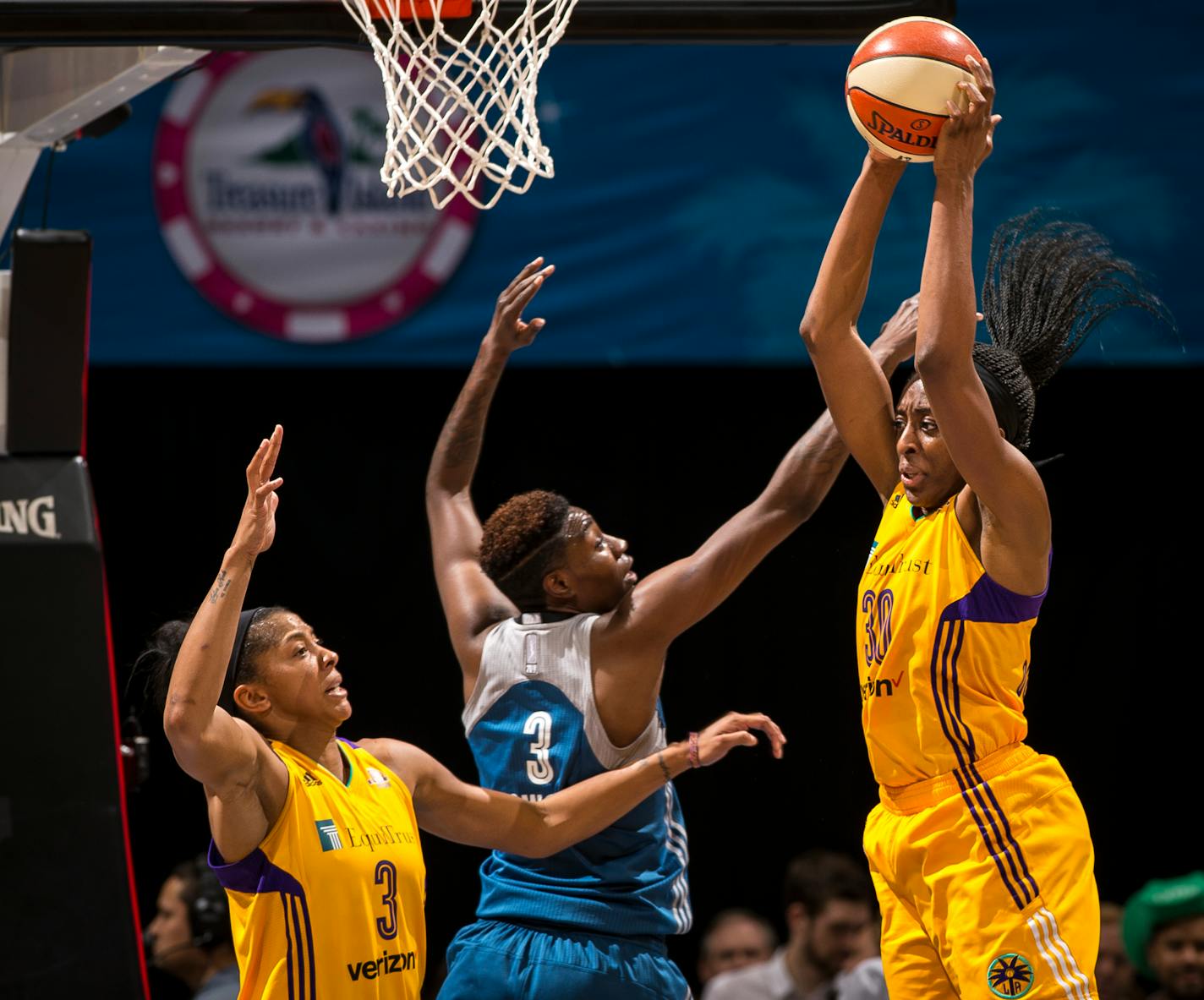 Sparks forward Nneka Ogwumike pulled down a rebound while being challenged under Minnesota's basket by Lynx forward Natasha Howard (3) in a June meeting between the two teams at Target Center.