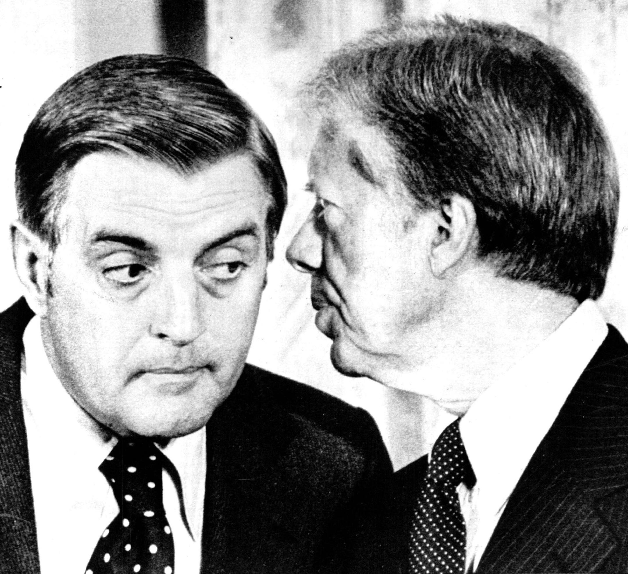 October 18, 1979 High-level, but low-decibel, conference - Vice President Walter Mondale listed intently to President Carter Wednesday during a ceremony in the White House at which carter signed legislation creating the Department of Education. The precise topic of their conversation wasn't known. United Press International ORG XMIT: MIN2015101515022781