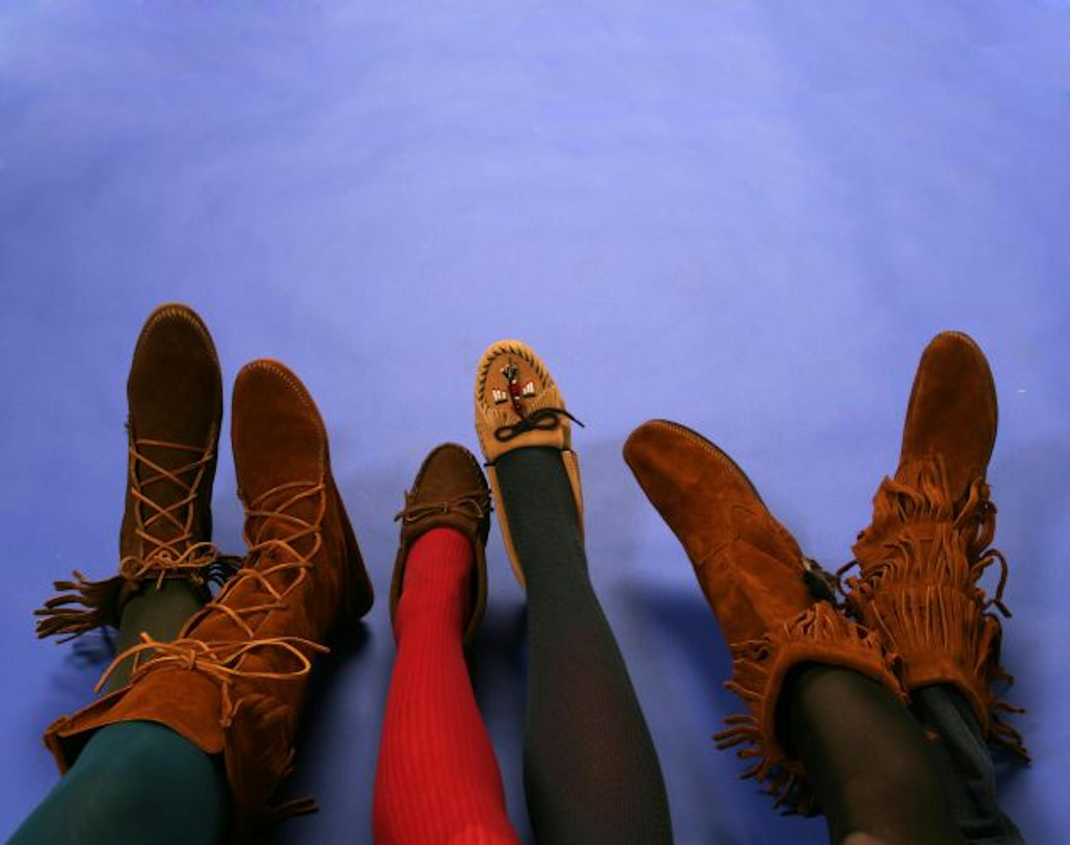 Minnetonka moccasins are among the shoes worn for a "shoeless" effect.