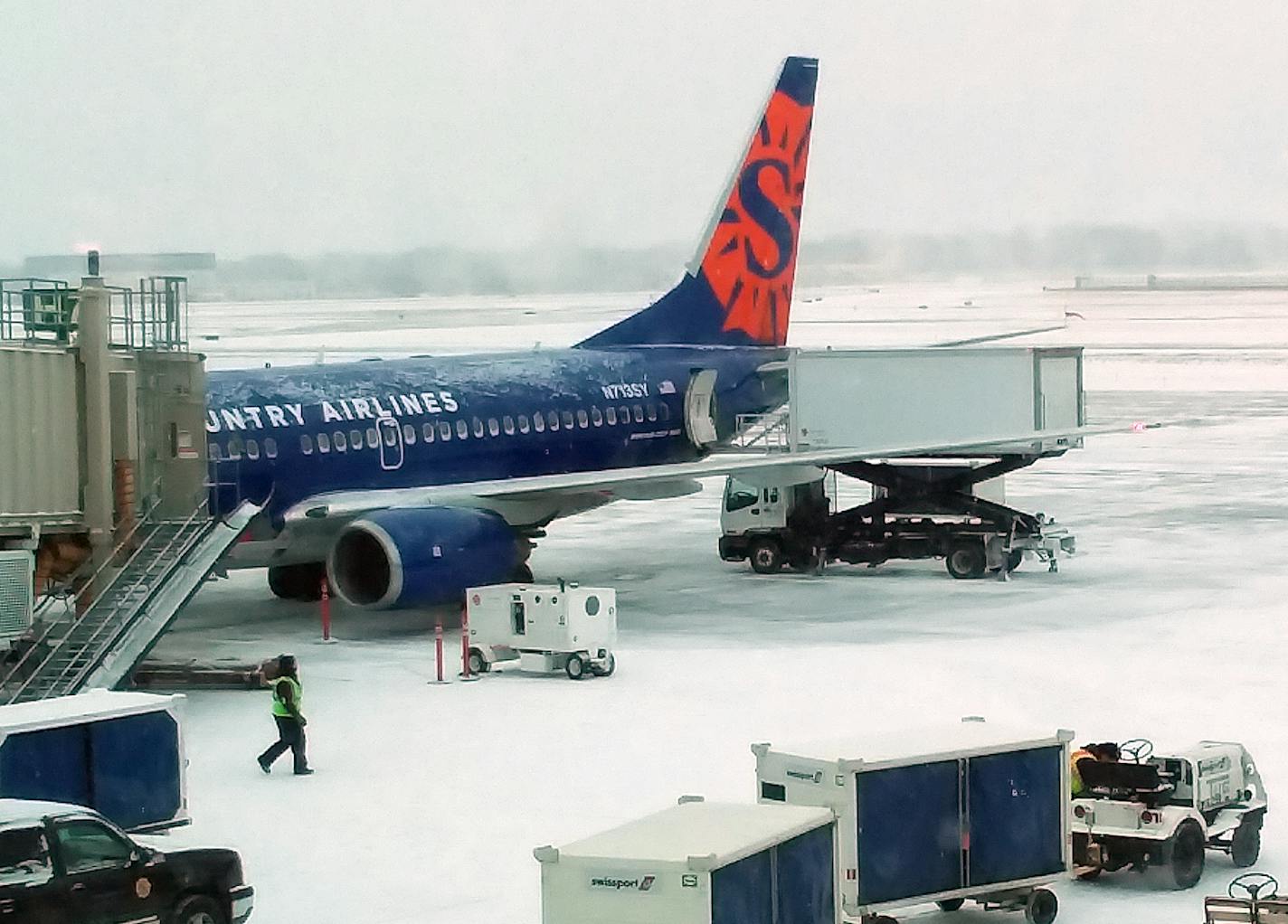 Sun Country flight in Humphrey Terminal during a winter storm.
Photo by Lewis Leung