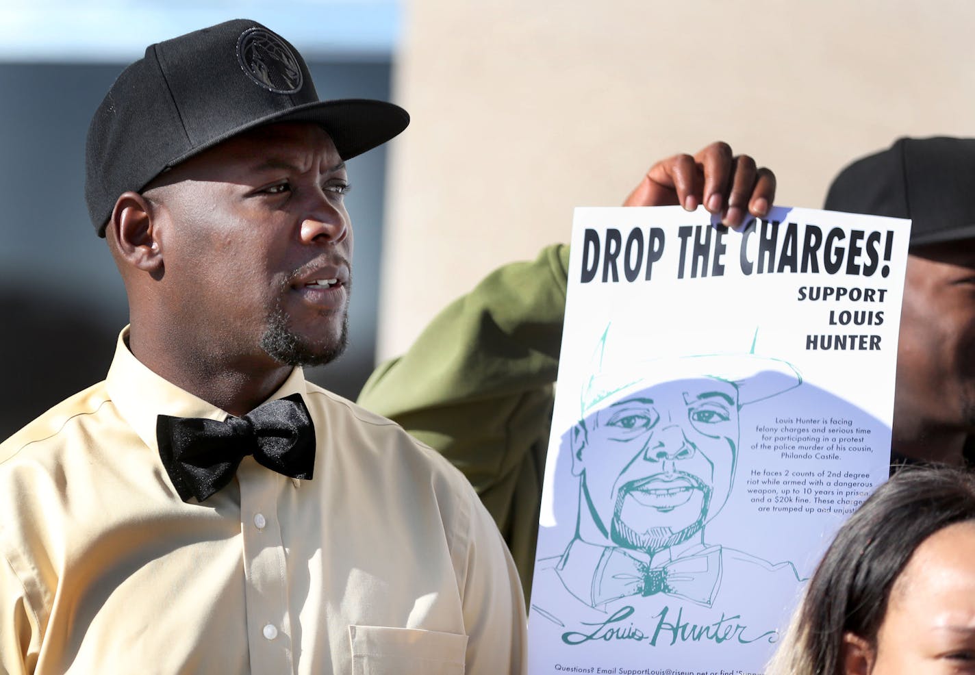 Louis Hunter, left, at a rally for Hunter, Philando Castile's cousin, in support of charges against him being dropped, Thursday, Nov. 10, 2016, outside the Ramsey County Courthouse in St. Paul, MN.] (DAVID JOLES/STARTRIBUNE)djoles@startribune.com Members of the Twin Cities community came out to support Louis Hunter as he faces felony charges for protesting the murder of his cousin Philando Castile. Hunter is facing two counts of felony riot, the most serious charges of anyone who participated in