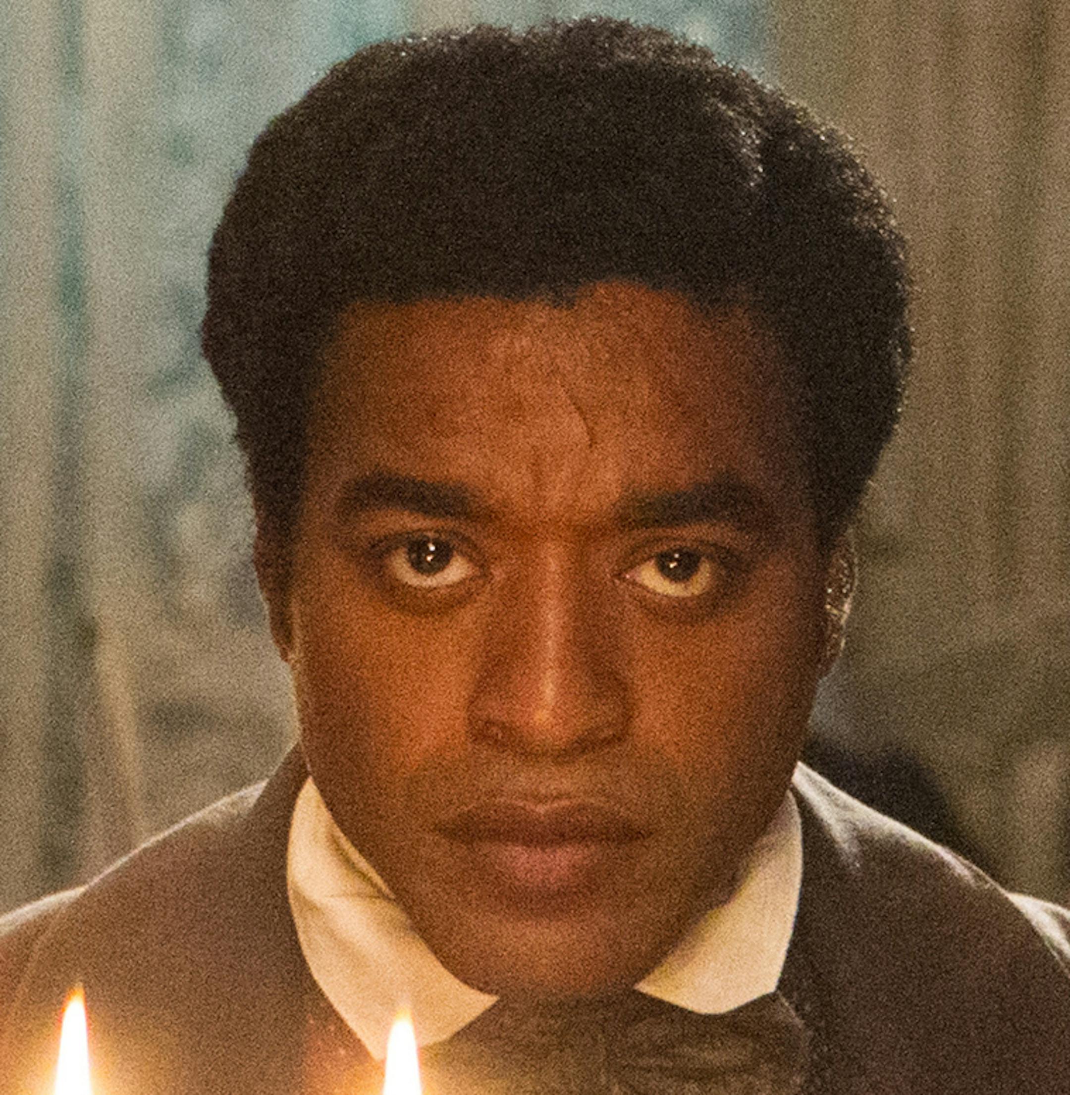 This film publicity image released by Fox Searchlight shows Chiwetel Ejiofor in a scene from "12 Years A Slave." The film was nominated for a Golden Globe for best motion picture drama on Thursday, Dec. 12, 2013. The 71st annual Golden Globes will air on Sunday, Jan. 12. (AP Photo/Fox Searchlight Films, Jaap Buitendijk)