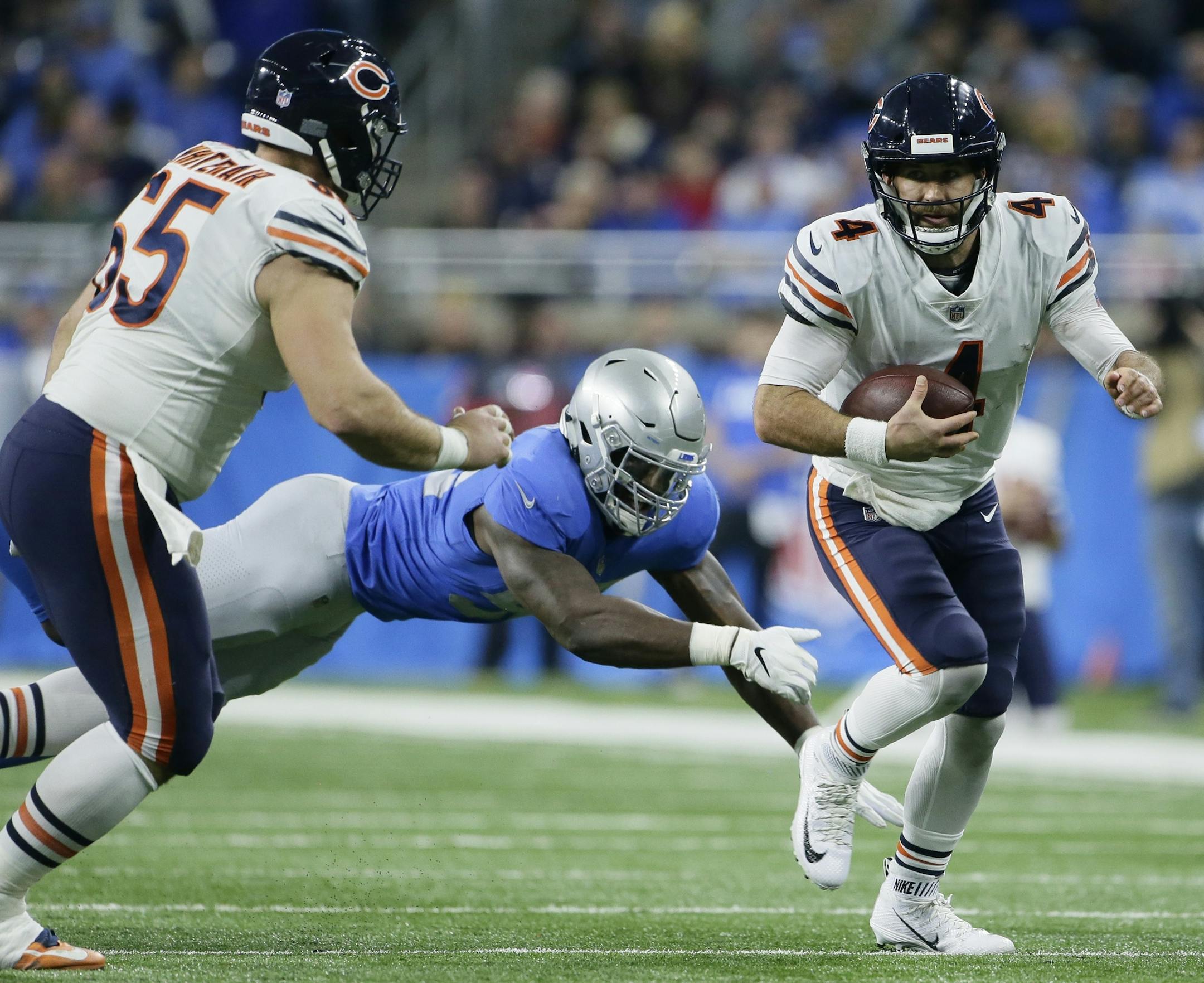 Chicago Bears quarterback Chase Daniel (4) scrambles during the second half of an NFL football game against the Detroit Lions, Thursday, Nov. 22, 2018, in Detroit. (AP Photo/Duane Burleson)