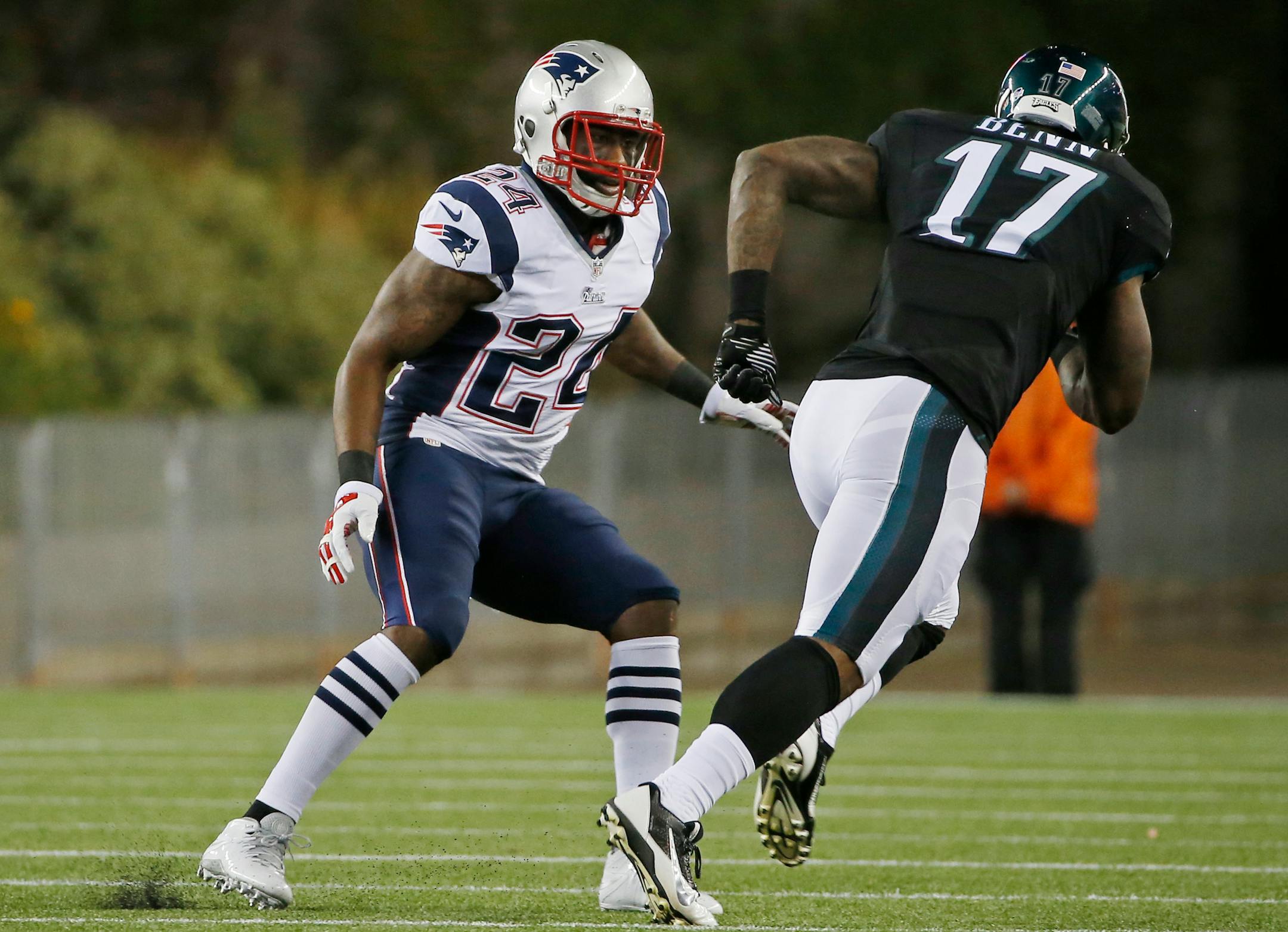 New England Patriots cornerback Darrelle Revis (24) covers Philadelphia Eagles wide receiver Arrelious Benn (17) in the first half of an NFL preseason football game Friday, Aug. 15, 2014, in Foxborough, Mass. (AP Photo/Elise Amendola)