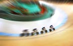 For about five minutes Saturday morning, the U.S. held the world record in women�s team pursuit. Kelly Catlin of Arden Hills (In the lead) and teamm