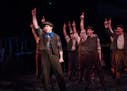 Aleks Knezevich as Jack Kelly, leading a crew of newsboys in "Disney's Newsies" at Chanhassen Dinner Theatres.