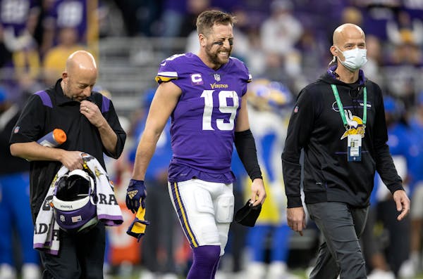 Adam Thielen reinjured his ankle during Sunday’s loss to the Rams at U.S. Bank Stadium.