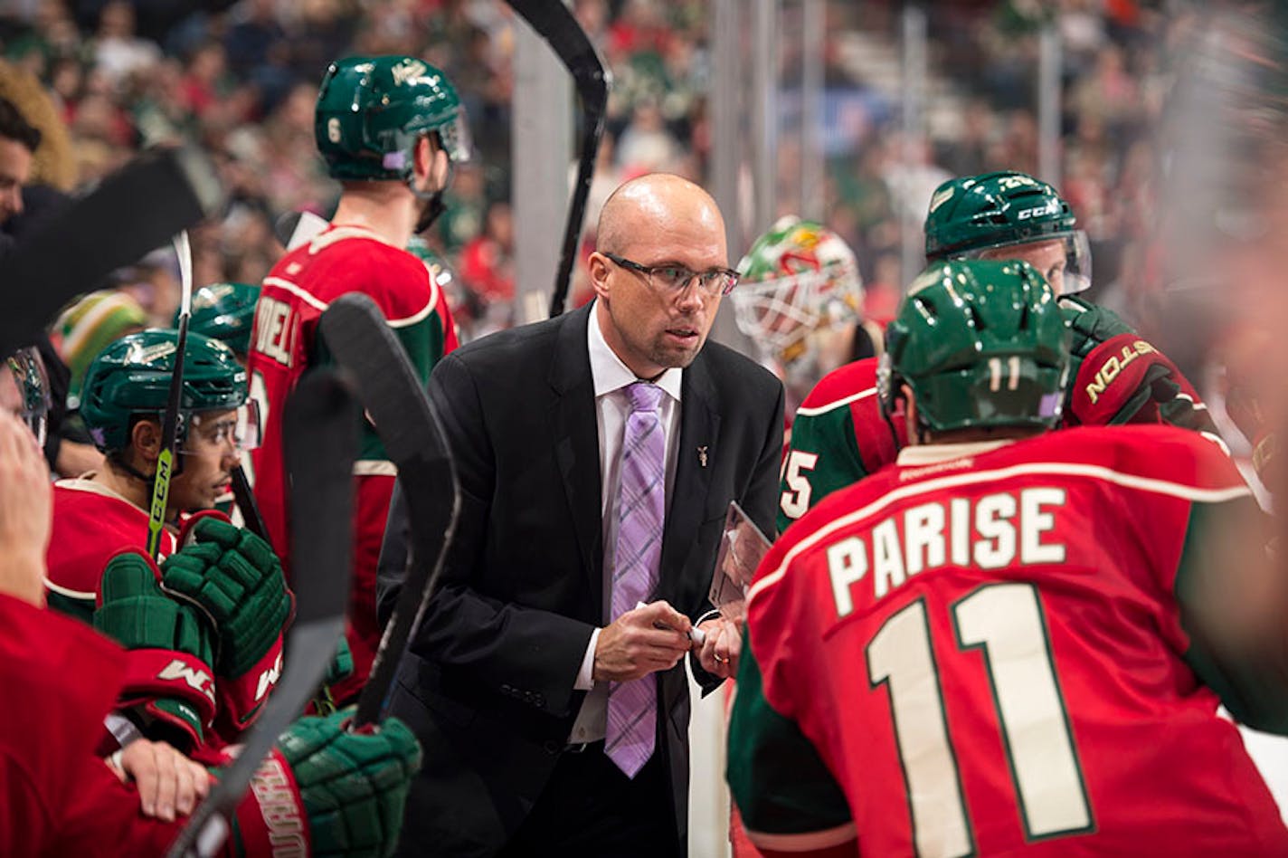 Minnesota Wild head coach Mike Yeo talked to left wing Zach Parise (11) during a game in October.