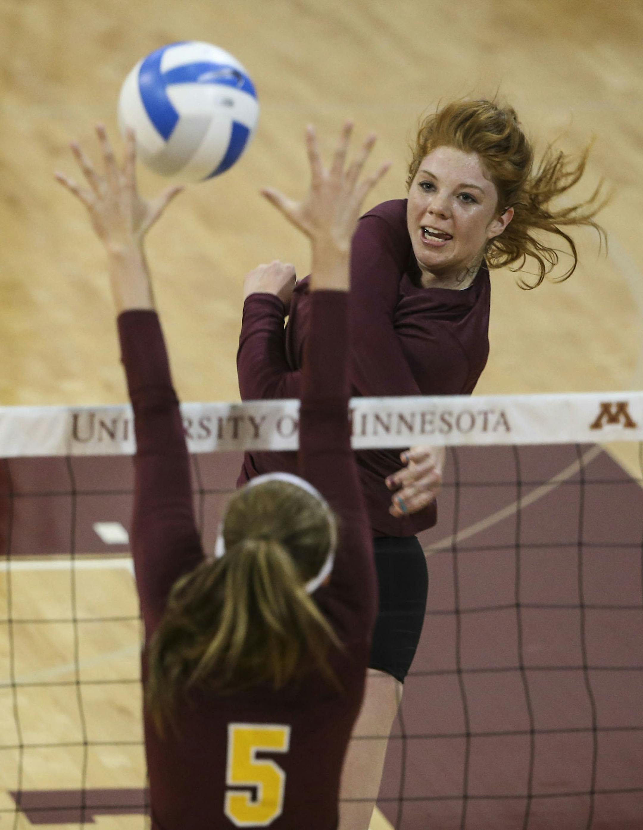 University of Minnesota women's volleyball team member Adrianna Nora spikes past teammate Alyssa Goehner during practice at the Sports Pavillion Wednesday, Aug. 27, 2014, in Minneapolis, MN.] (DAVID JOLES/STARTRIBUNE) djoles@startribune Gophers volleyball season preview, with chart. The Gophers are ranked 12th in the preseason polls, but return only three upperclassmen.