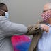 (Left) Duluth Human Rights Officer Carl Crawford greeted Governor Tim Walz with an elbow bump on Monday morning.
