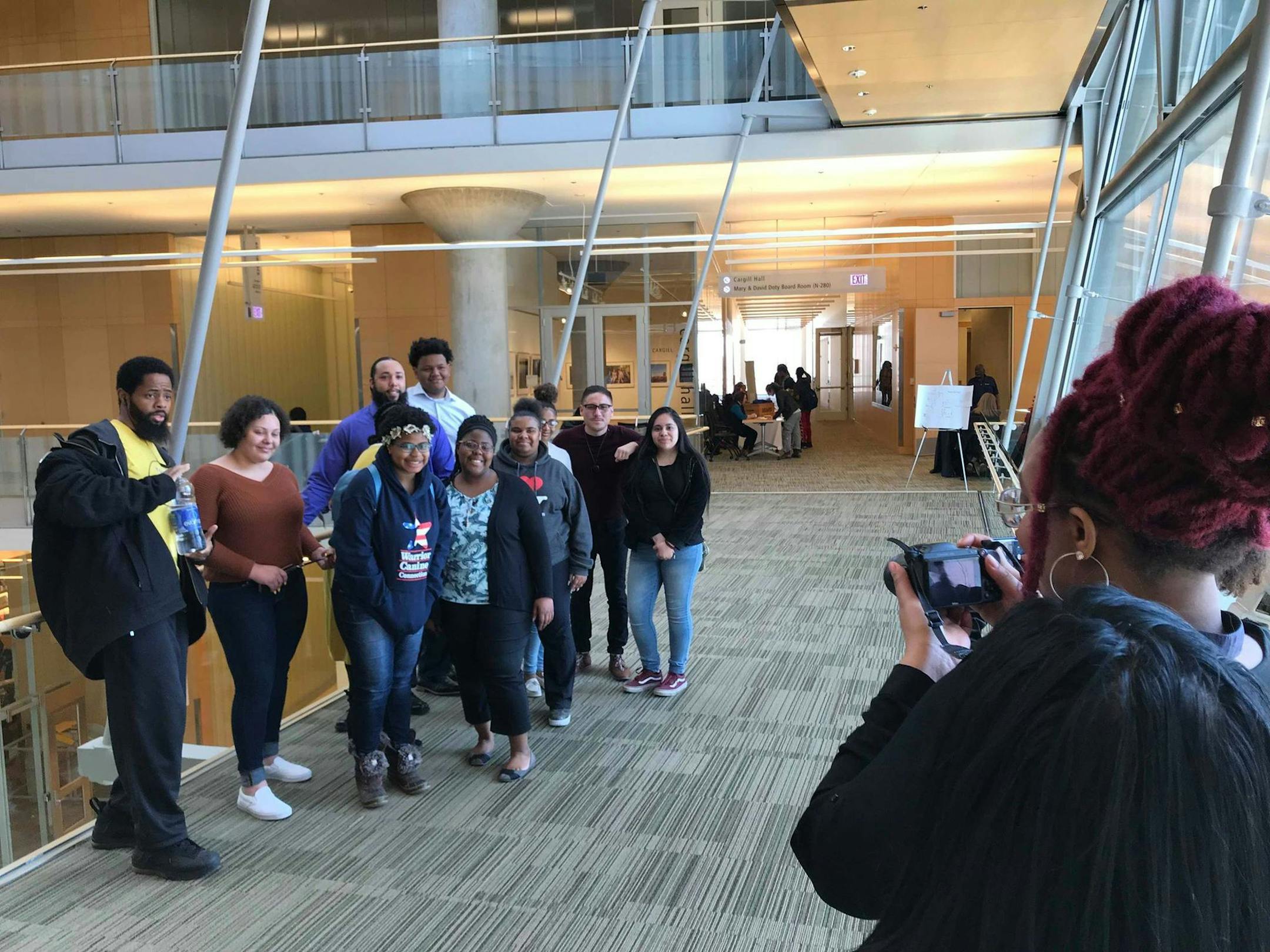 Members of the Minneapolis Youth Congress pose for a picture inside the Minneapolis Central Library during the 13th annual Minneapolis Teen Job Fair on Saturday, April 21, 2018.