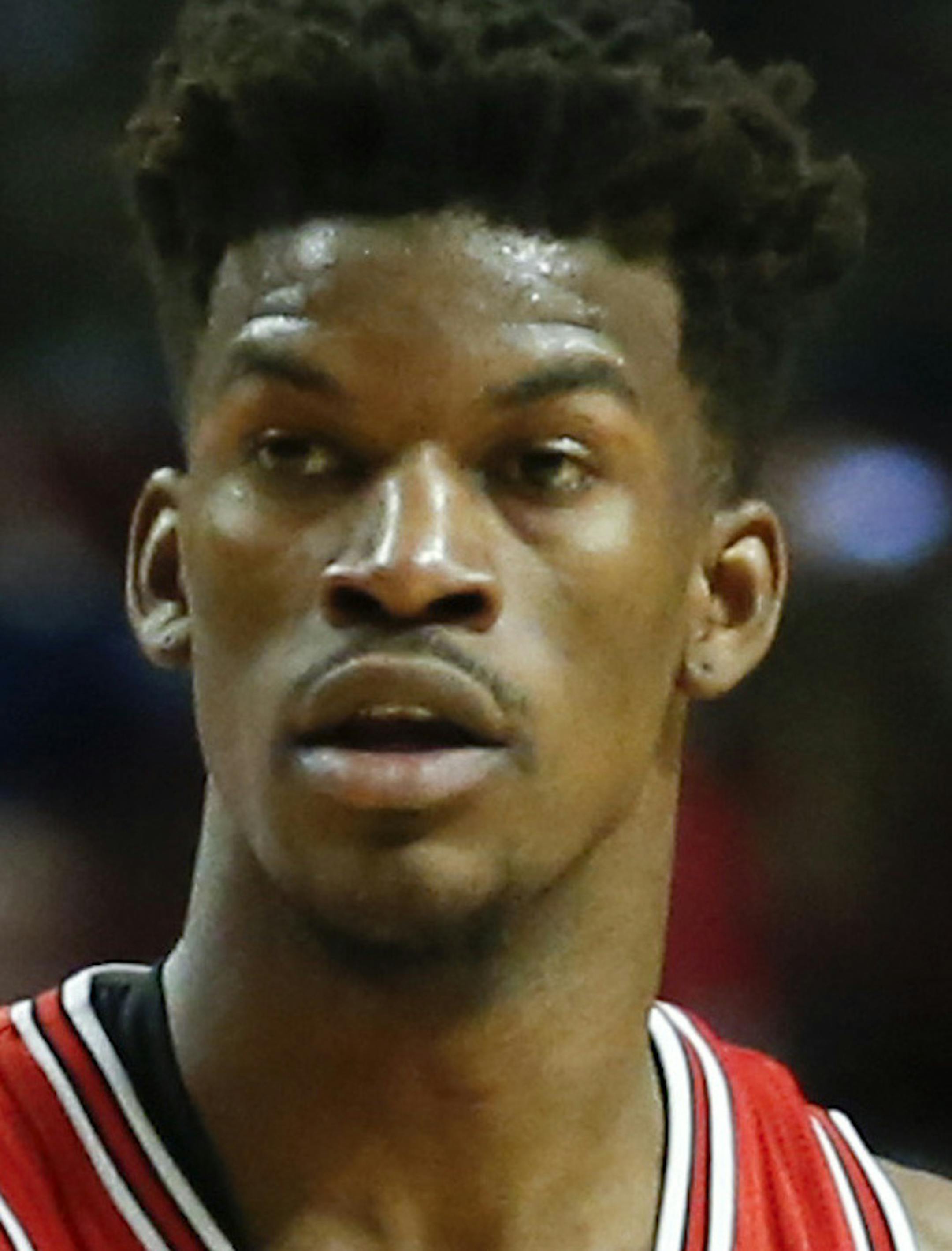 Chicago Bulls guard Jimmy Butler looks to pass the ball against the Philadelphia 76ers during the second half of an NBA basketball game, Wednesday, April 13, 2016 in Chicago. The Bulls won 115-105. (AP Photo/Kamil Krzaczynski) ORG XMIT: CXA136 ORG XMIT: MIN1612240046270155 ORG XMIT: MIN1706191845201092