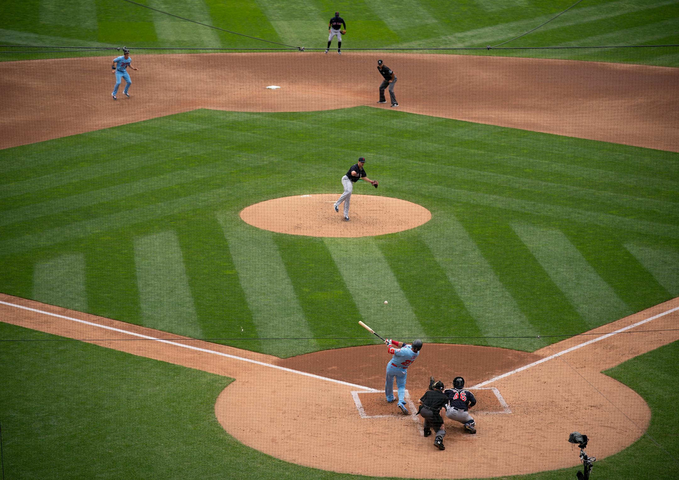 Minnesota Twins right fielder Max Kepler (26) scored from second base when Minnesota Twins designated hitter Nelson Cruz (23) singled in the third inning.