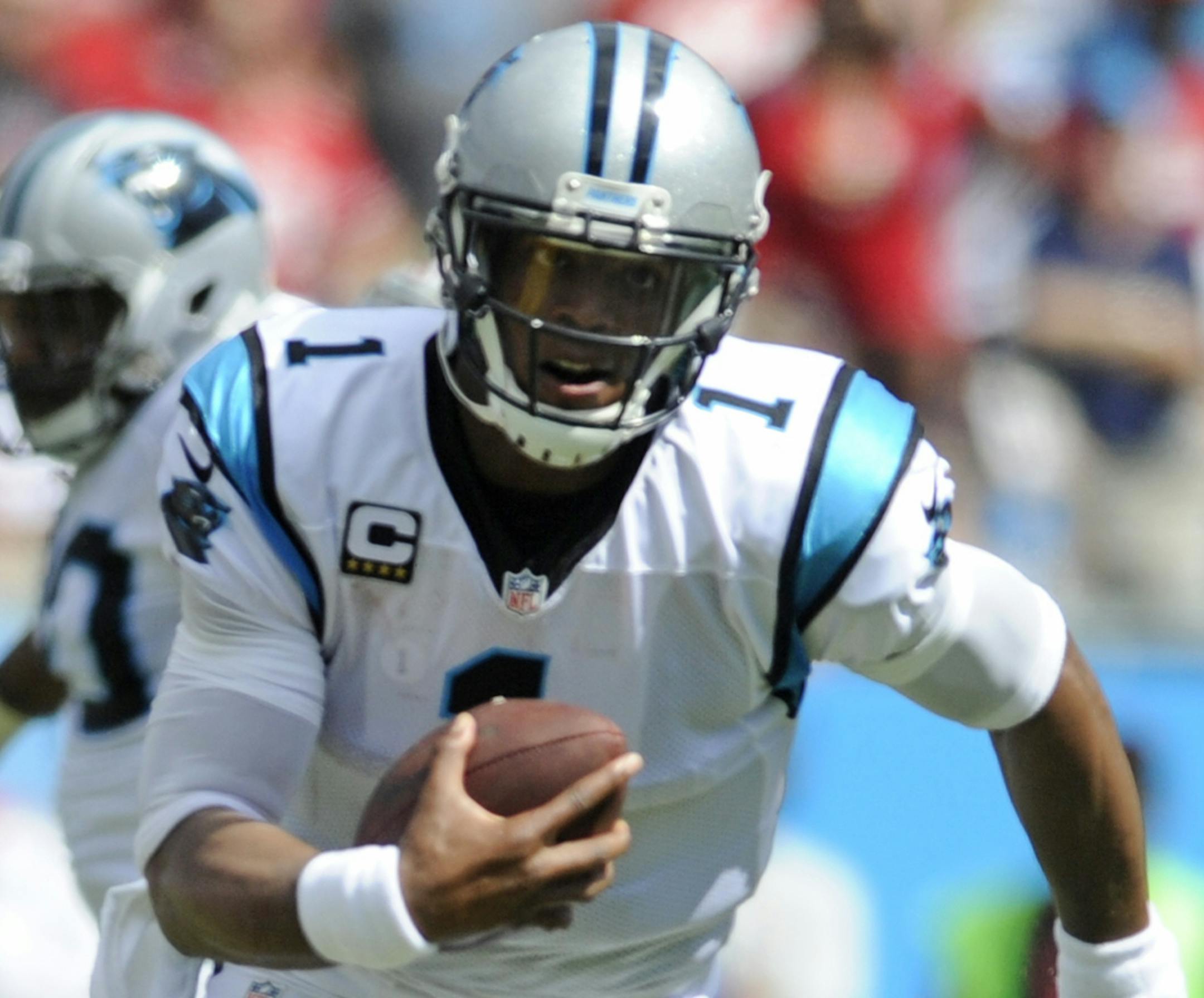 Carolina Panthers' Cam Newton (1) runs against the San Francisco 49ers in the first half of an NFL football game in Charlotte, N.C., Sunday, Sept. 18, 2016. (AP Photo/Mike McCarn)