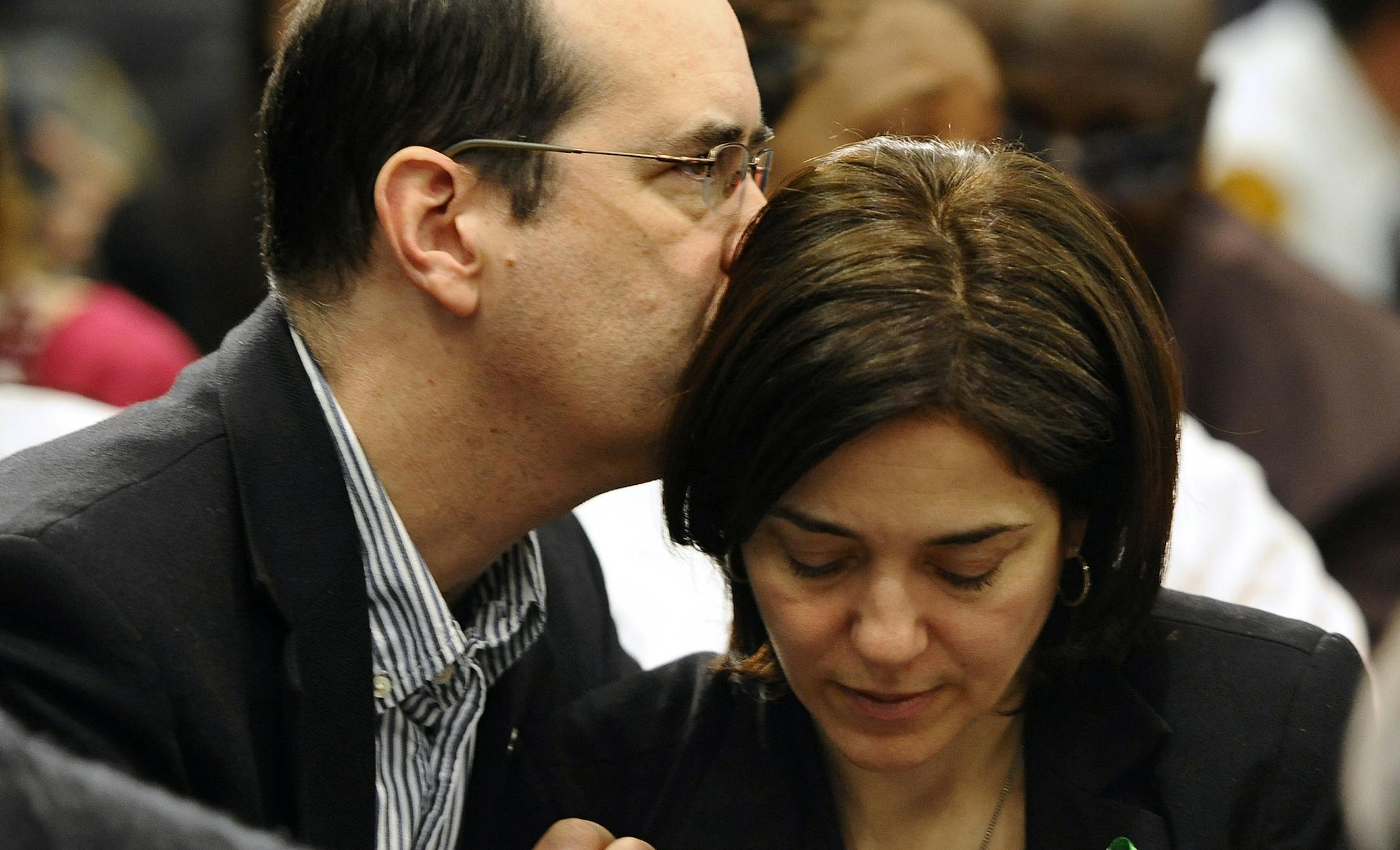 David and Francine Wheeler, parents of Sandy Hook Elementary School shooting victim Benjamin Wheeler, embrace, during a gun violence conference in Danbury, Conn., Thursday, Feb. 21, 2013. The conference, held near Newtown, Conn. where 26 lives were lost in the Sandy Hook Elementary School shooting, was organized by members of the state's congressional delegation is to push President Barack Obama's gun control proposals. (AP Photo/Jessica Hill)