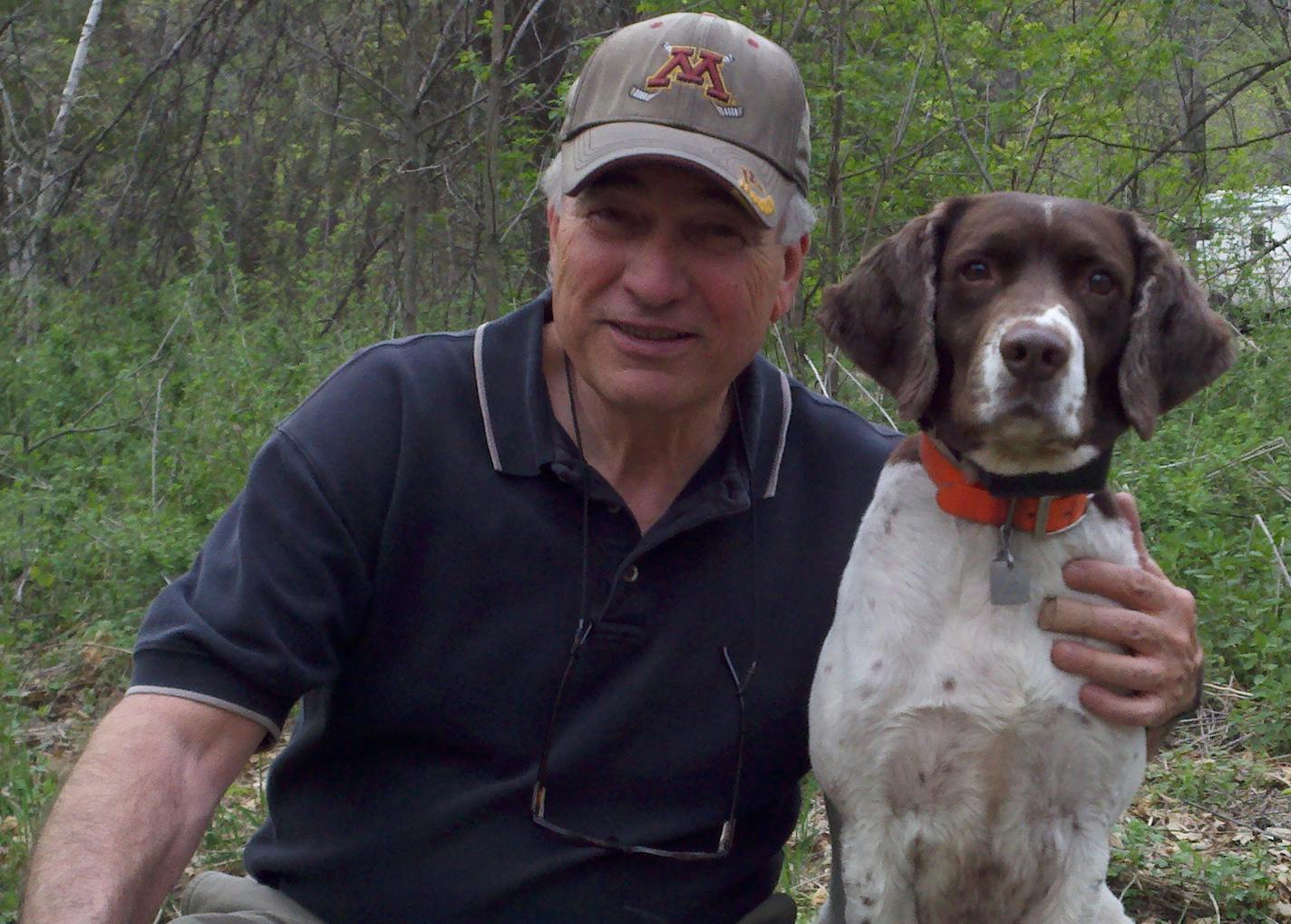 Tom Foster of Hudson, Wis., and his springer spaniel Sparkey. Foster saved his dog with mouth-to-mouth resuscitation this fall during a hunting accident. Photo courtsey Tom Foster