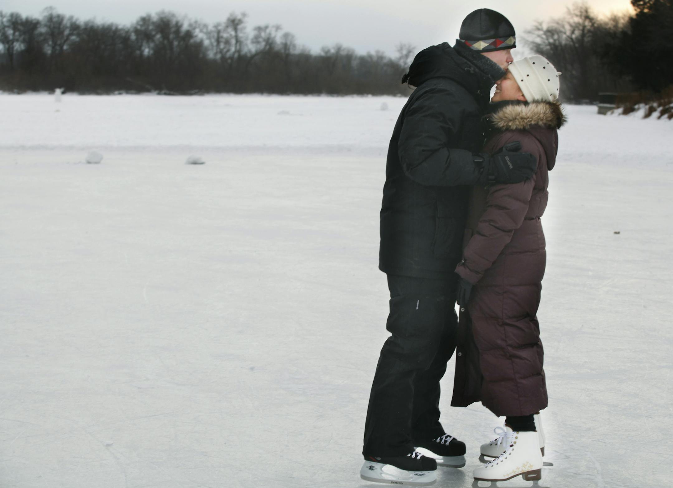 In Minneapolis where the wind chill brought temperatures to dangerous levels, Garret Jones and his wife Lauren were determined to go outside and "enjoy" the weather as the sun was about to set within the hour on Lake of the Isles.