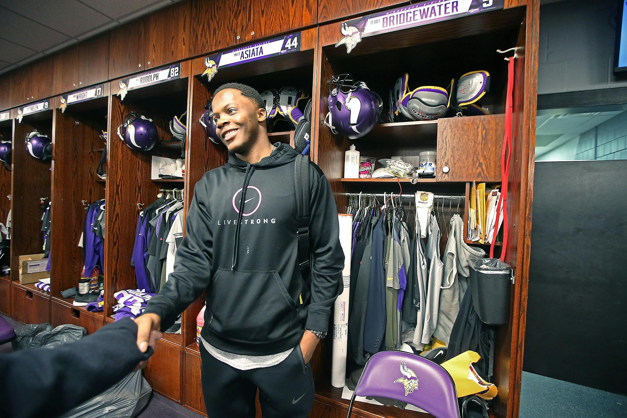 Minnesota Vikings Teddy Bridgewater was greeted by players and reporters in the locker room at Winter Park, Monday, January 11, 2016 in Eden Prairie, MN.