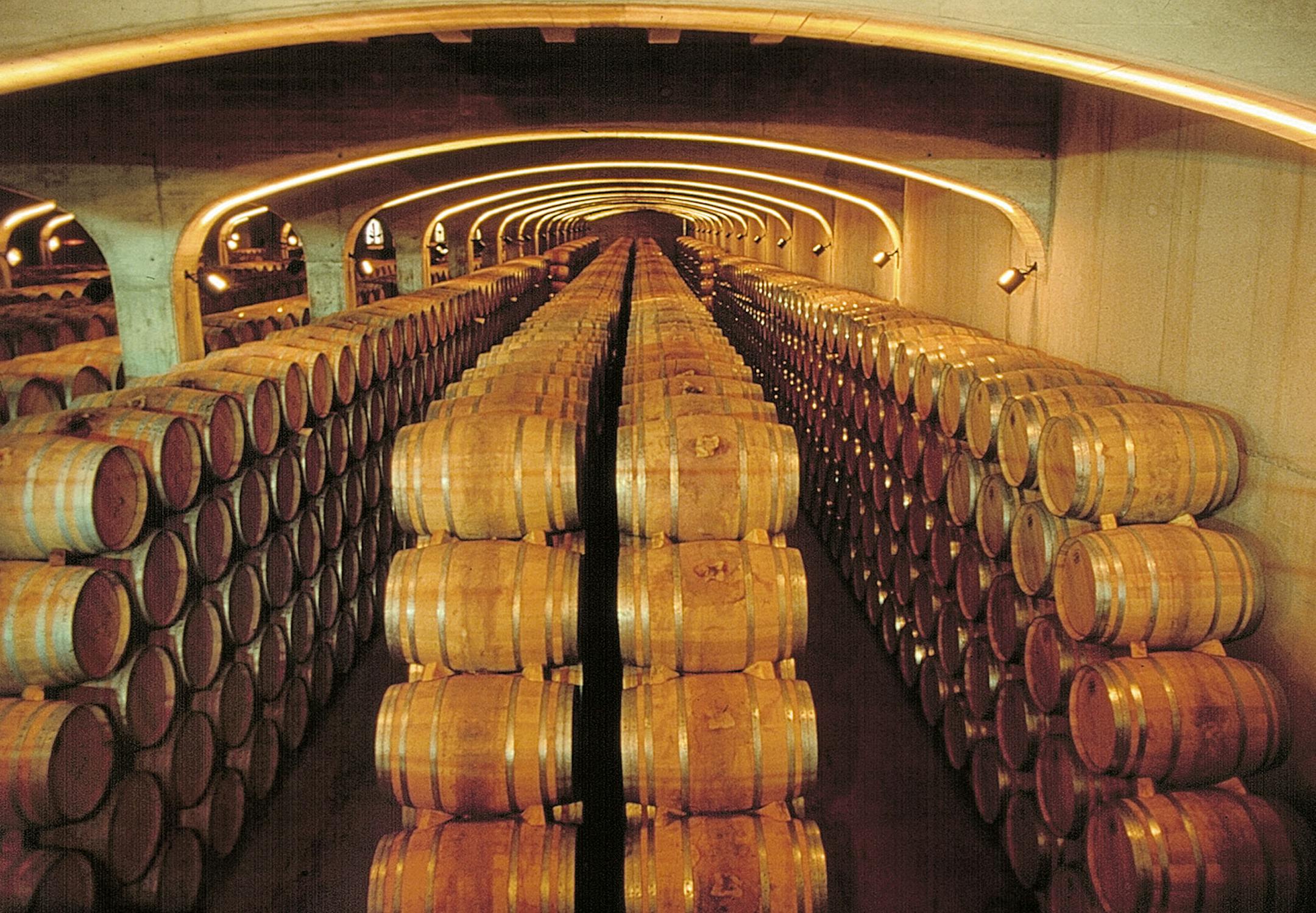 Barrels in the winery at Marques de Cáceres, located in the Rioja region of Spain.