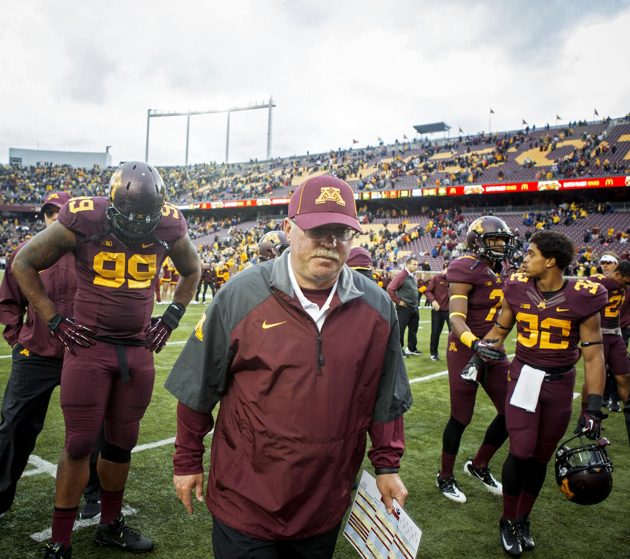 Jerry Kill, head coach for the University of Minnesota football team, walks off the field after a home game against the Iowa Hawkeyes in Minneapolis, Minn., Sept. 28, 2013. Kill, who had a seizure and missed the Oct. 5 game at Michigan, has stepped away to focus on treating and managing his epilepsy.(Jenn Ackerman/The New York Times)