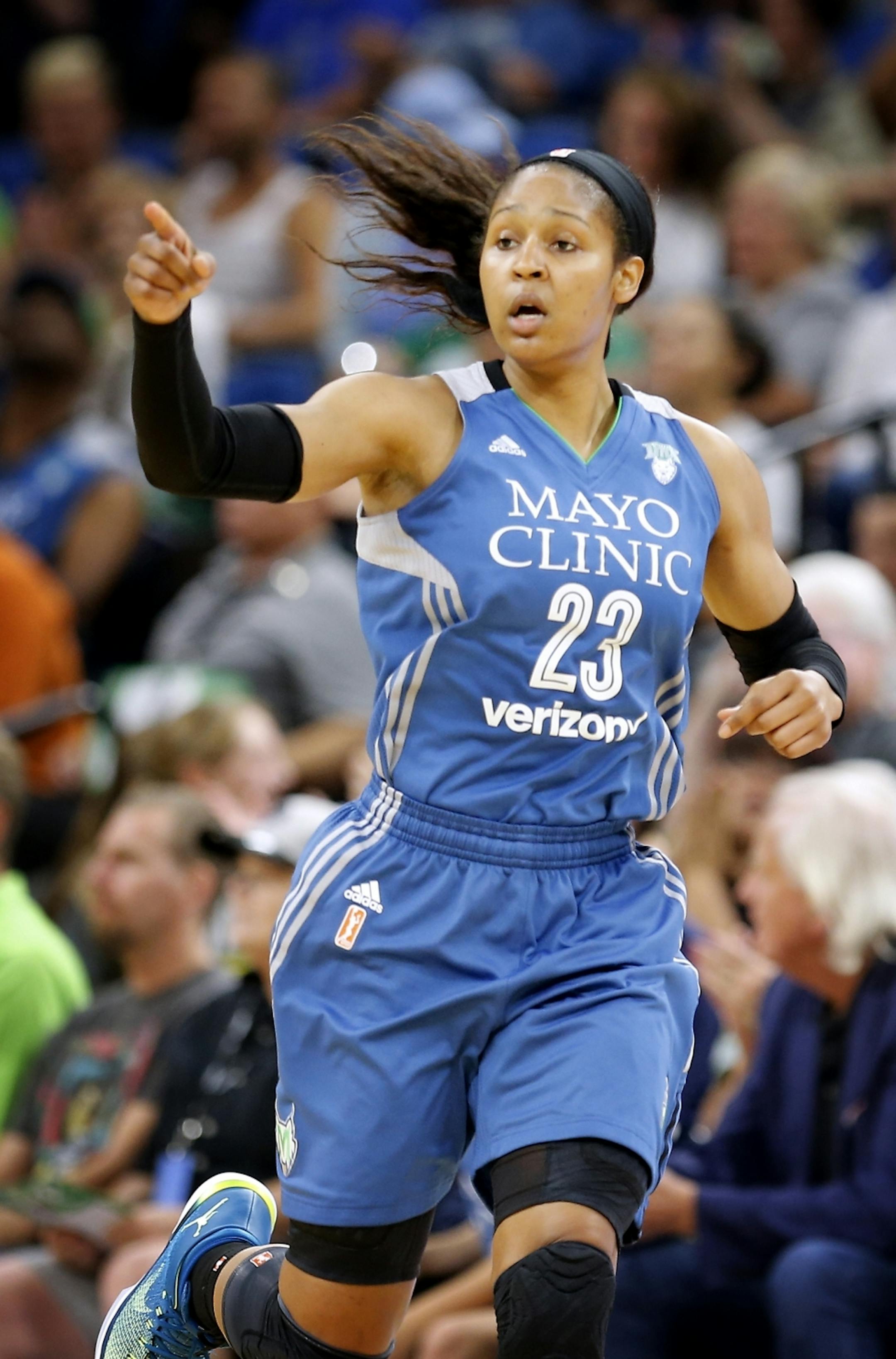 Minnesota Lynx forward Maya Moore (23) runs down the court during the first half.
