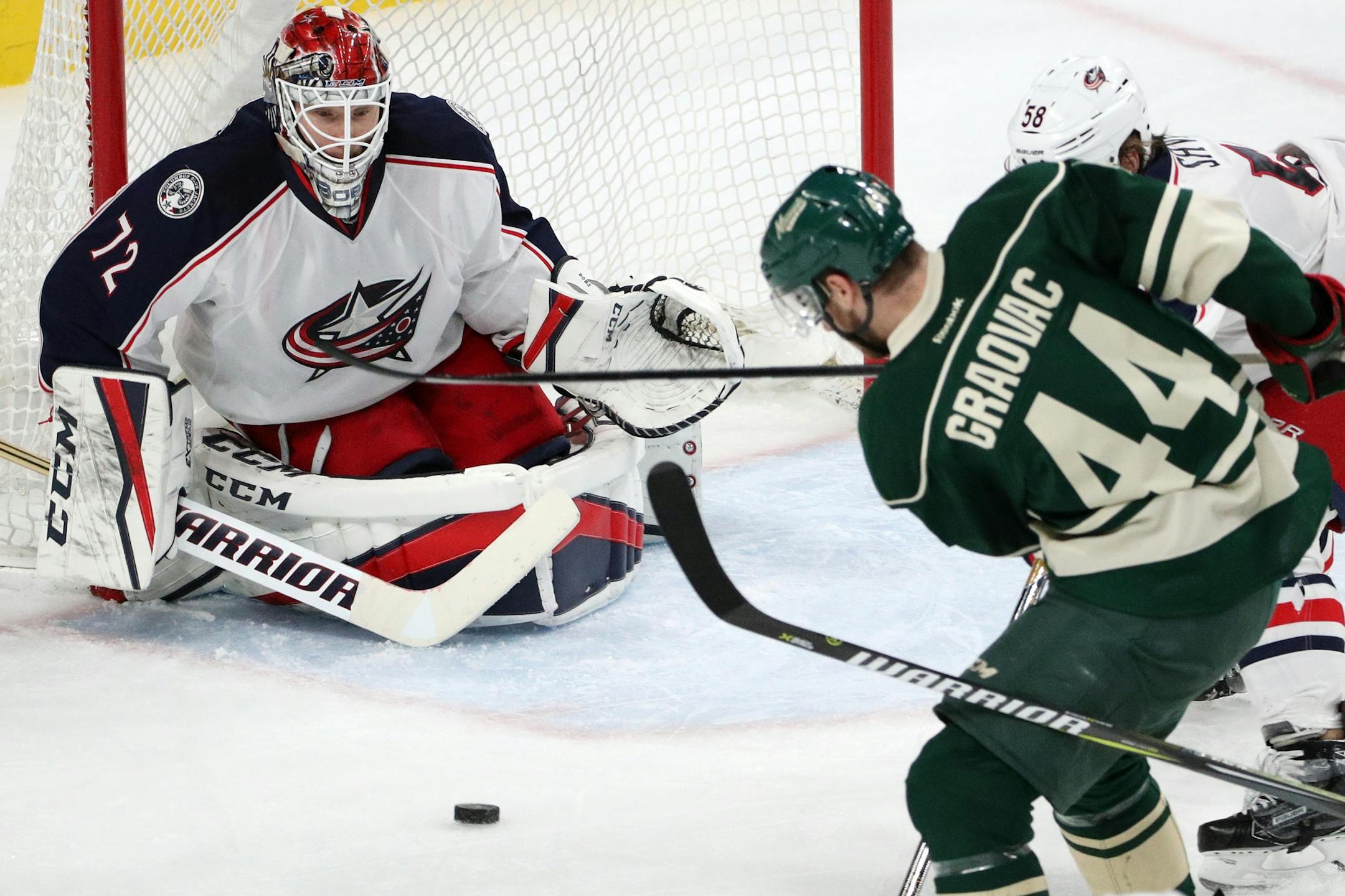 Minnesota Wild center Tyler Graovac (44) takes a shot on Columbus Blue Jackets goaltender Sergei Bobrovsky.